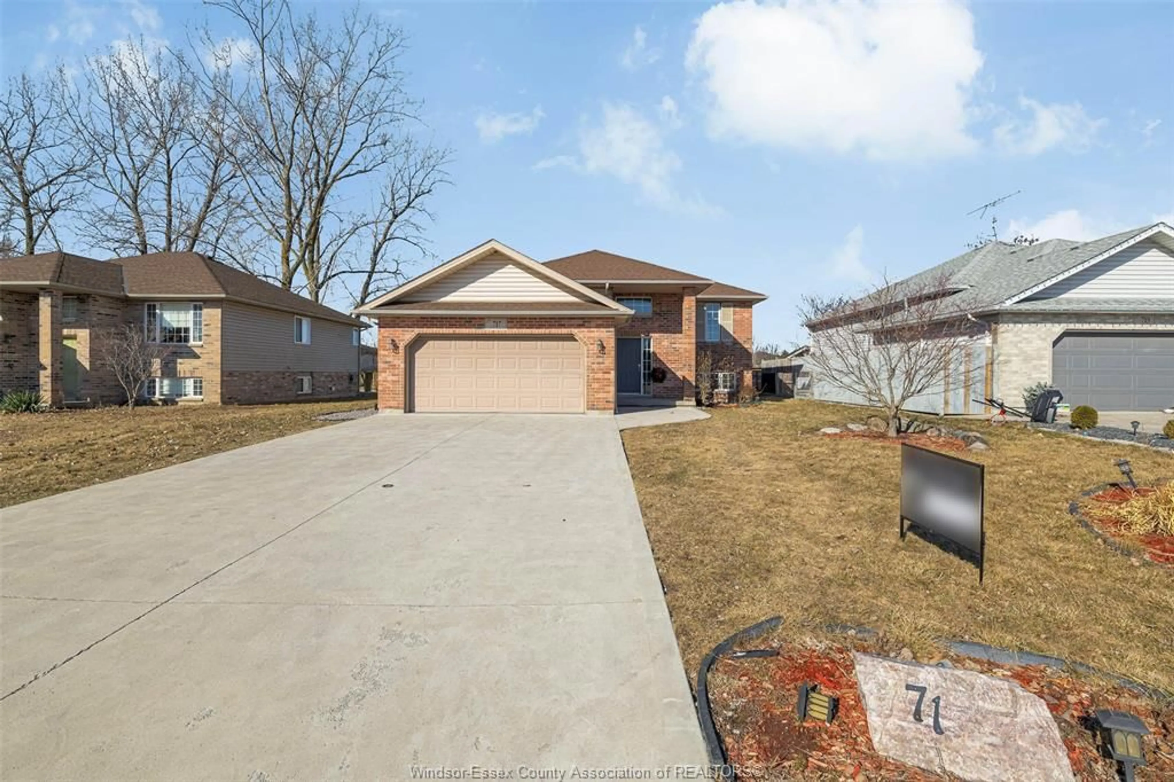 Home with brick exterior material, street for 717 HELENA Cres, Belle River Ontario N8L 0P7