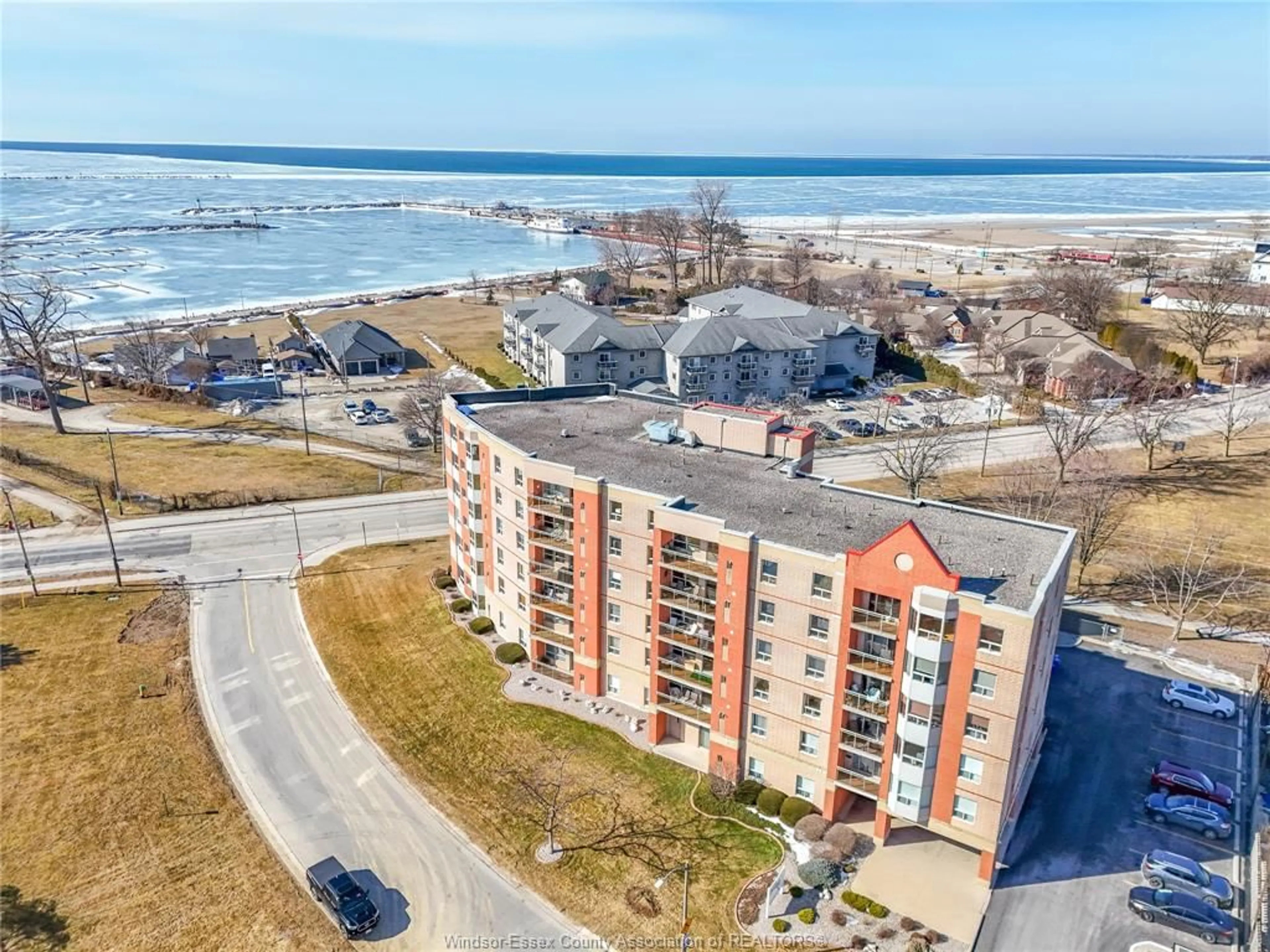 A pic from outside/outdoor area/front of a property/back of a property/a pic from drone, water/lake/river/ocean view for 99 ROBSON #203, Leamington Ontario N8H 2M8