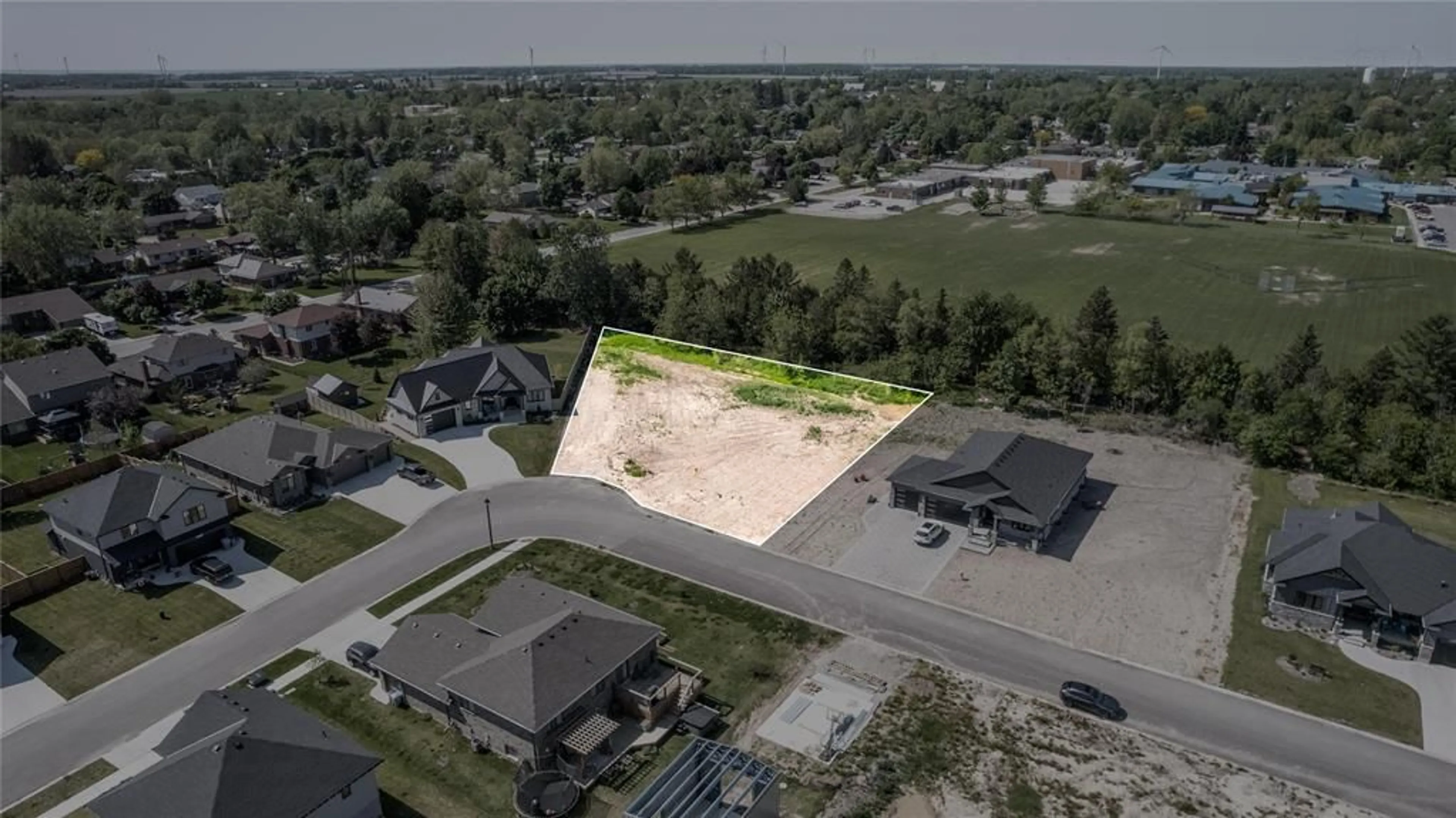 A pic from outside/outdoor area/front of a property/back of a property/a pic from drone, street for 118 PHIBBS St, Lambton Shores Ontario N0N 1J0