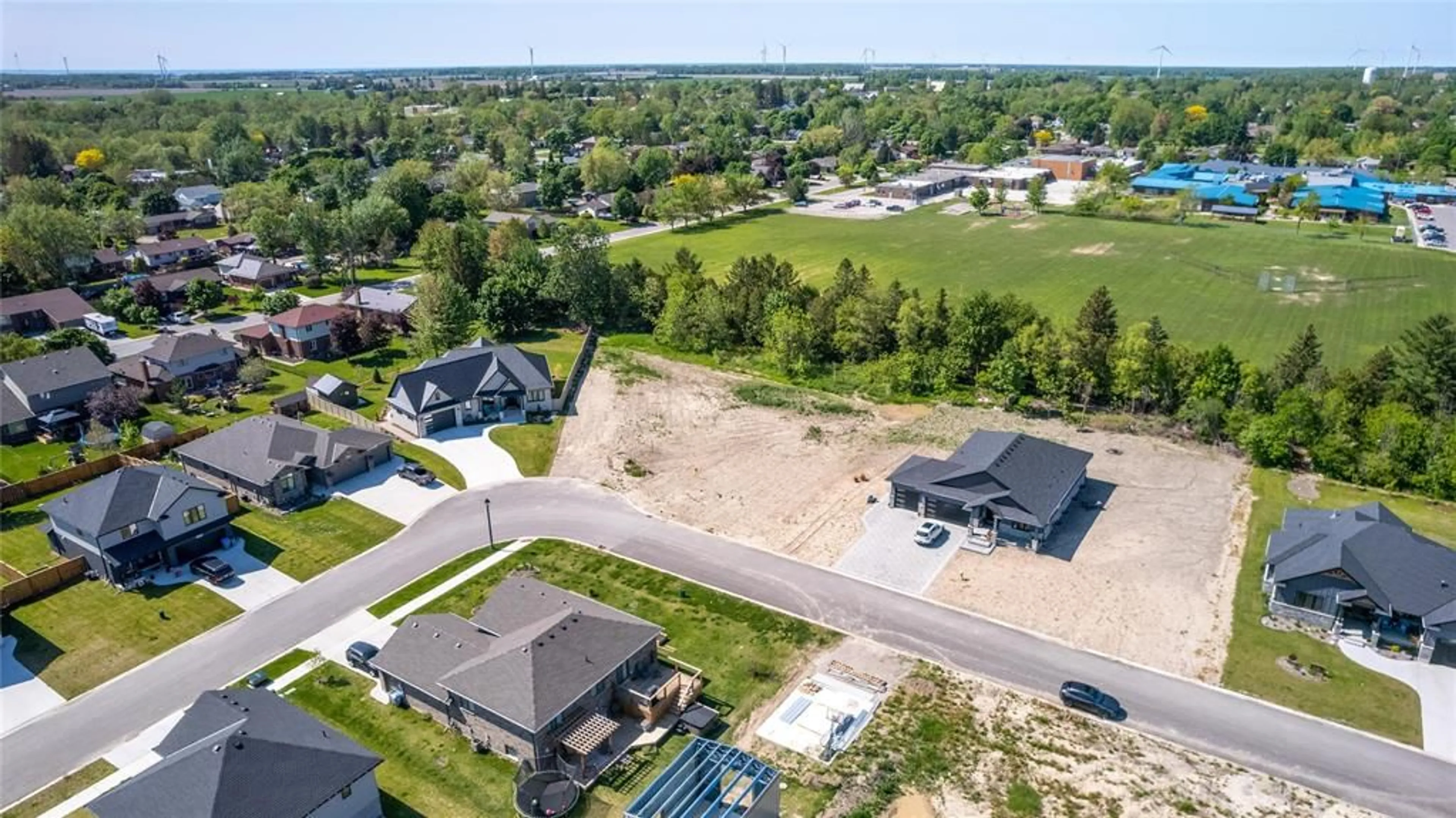 A pic from outside/outdoor area/front of a property/back of a property/a pic from drone, unknown for 118 PHIBBS St, Lambton Shores Ontario N0N 1J0