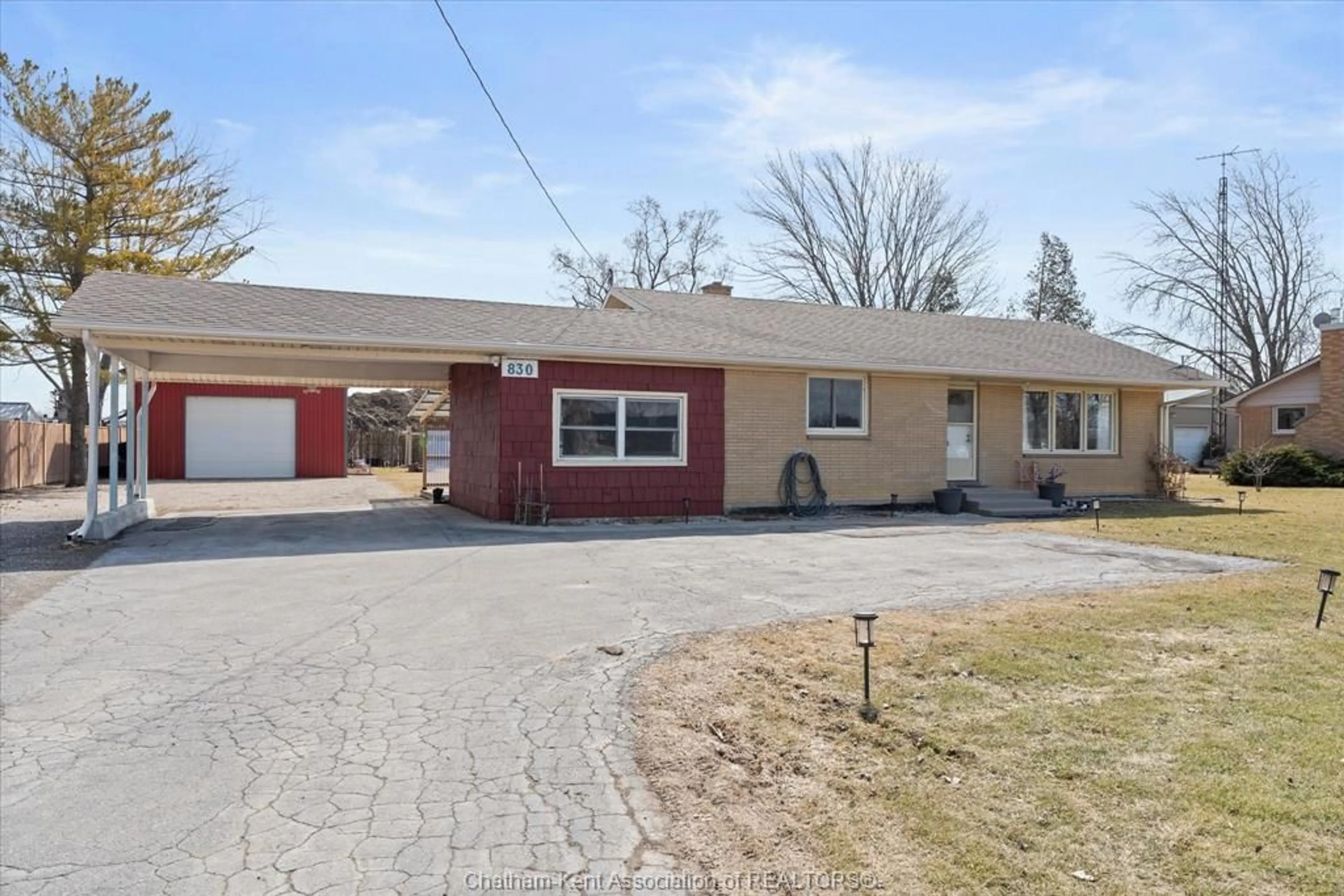 Home with brick exterior material, street for 830 Talbot Rd, Wheatley Ontario N0P2P0