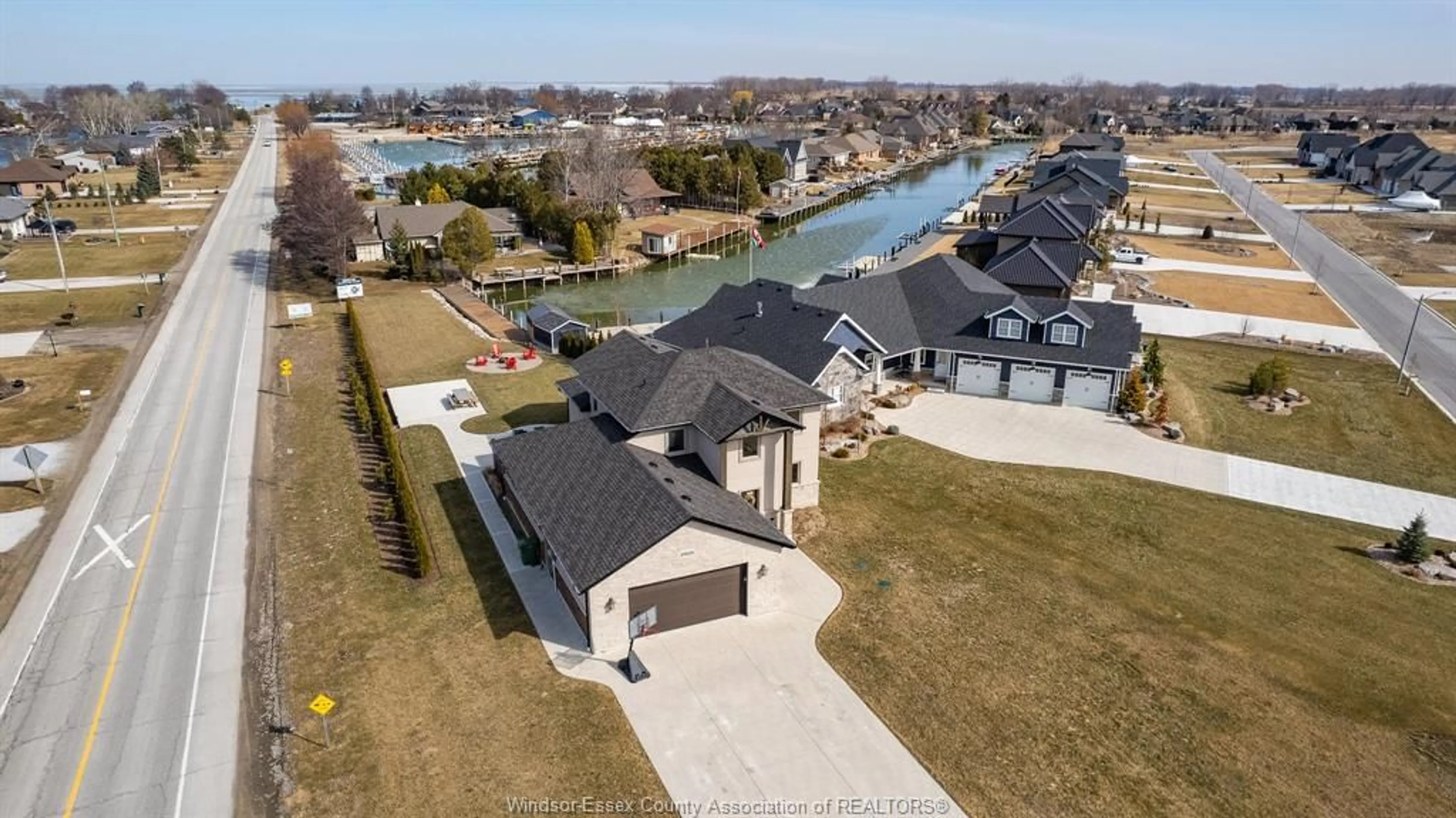 A pic from outside/outdoor area/front of a property/back of a property/a pic from drone, water/lake/river/ocean view for 19020 HAVEN Ave, Lakeshore Ontario N0P 2L0