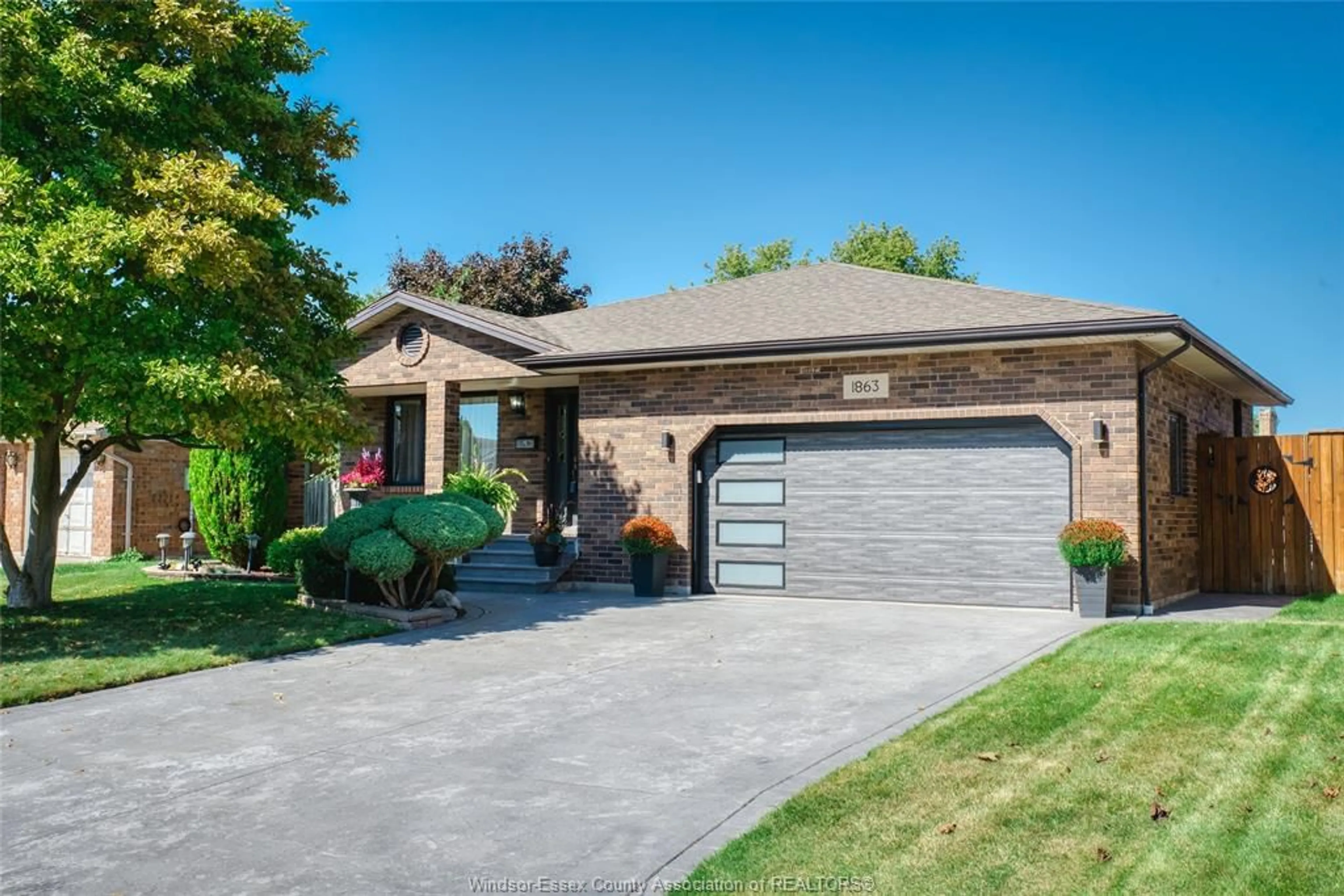 Home with brick exterior material, street for 1863 HEATHERSTONE Way, LaSalle Ontario N9H 2G1