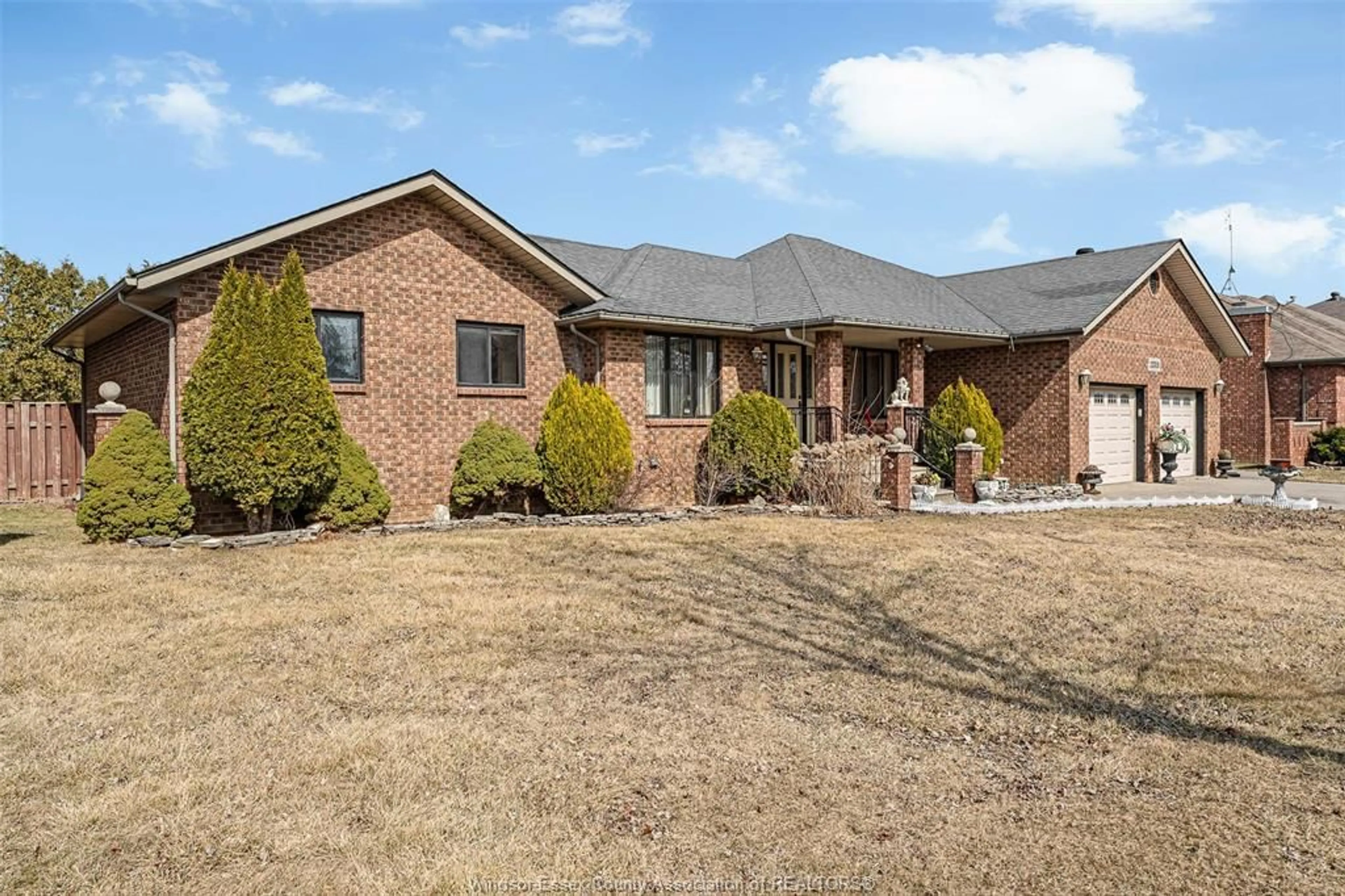 Home with brick exterior material, street for 12310 CANDLEWOOD, Tecumseh Ontario N9K 1B5