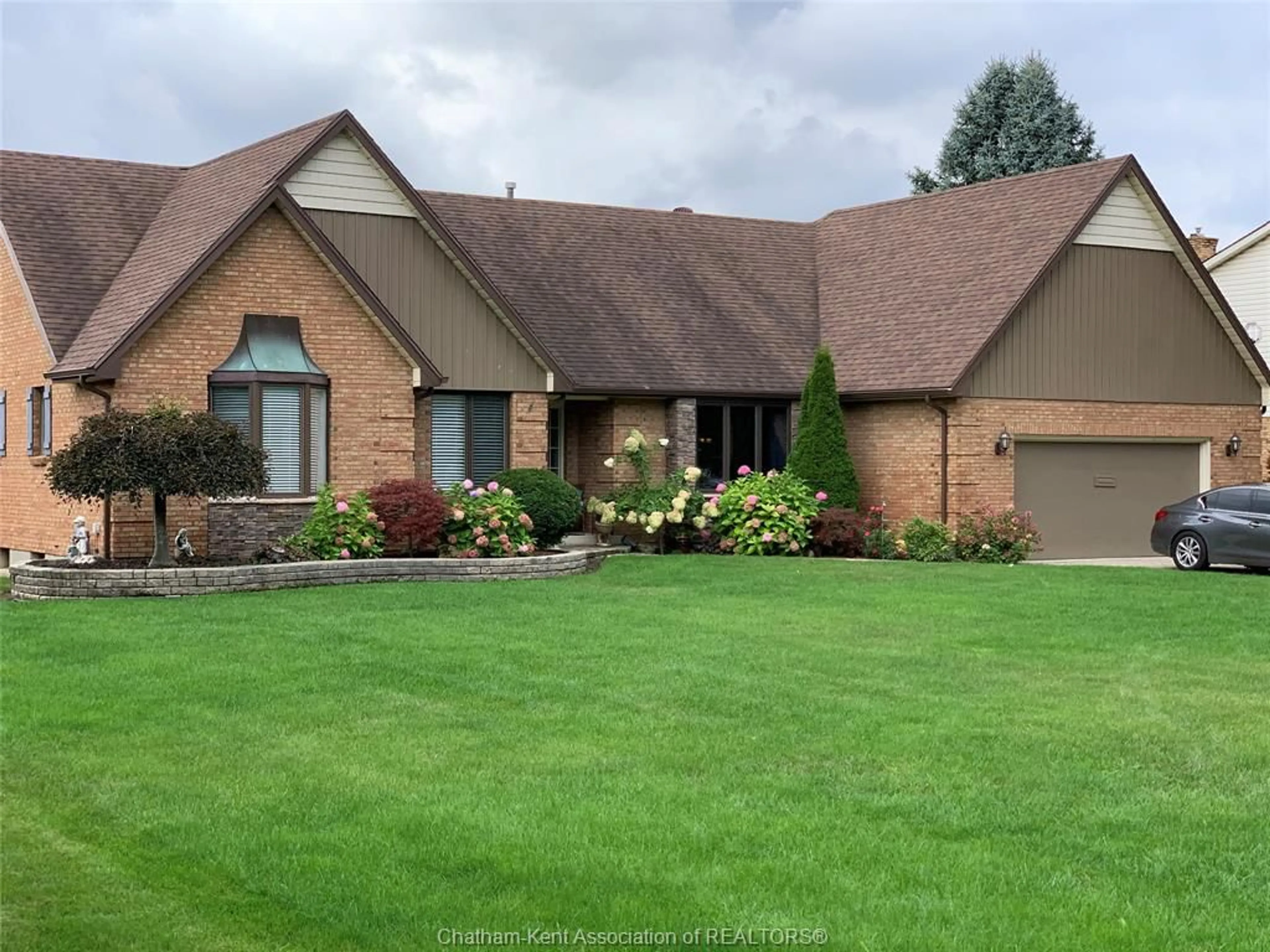 Home with brick exterior material, street for 22872 EAST LAWN Rd, Chatham Ontario N7M 5J4