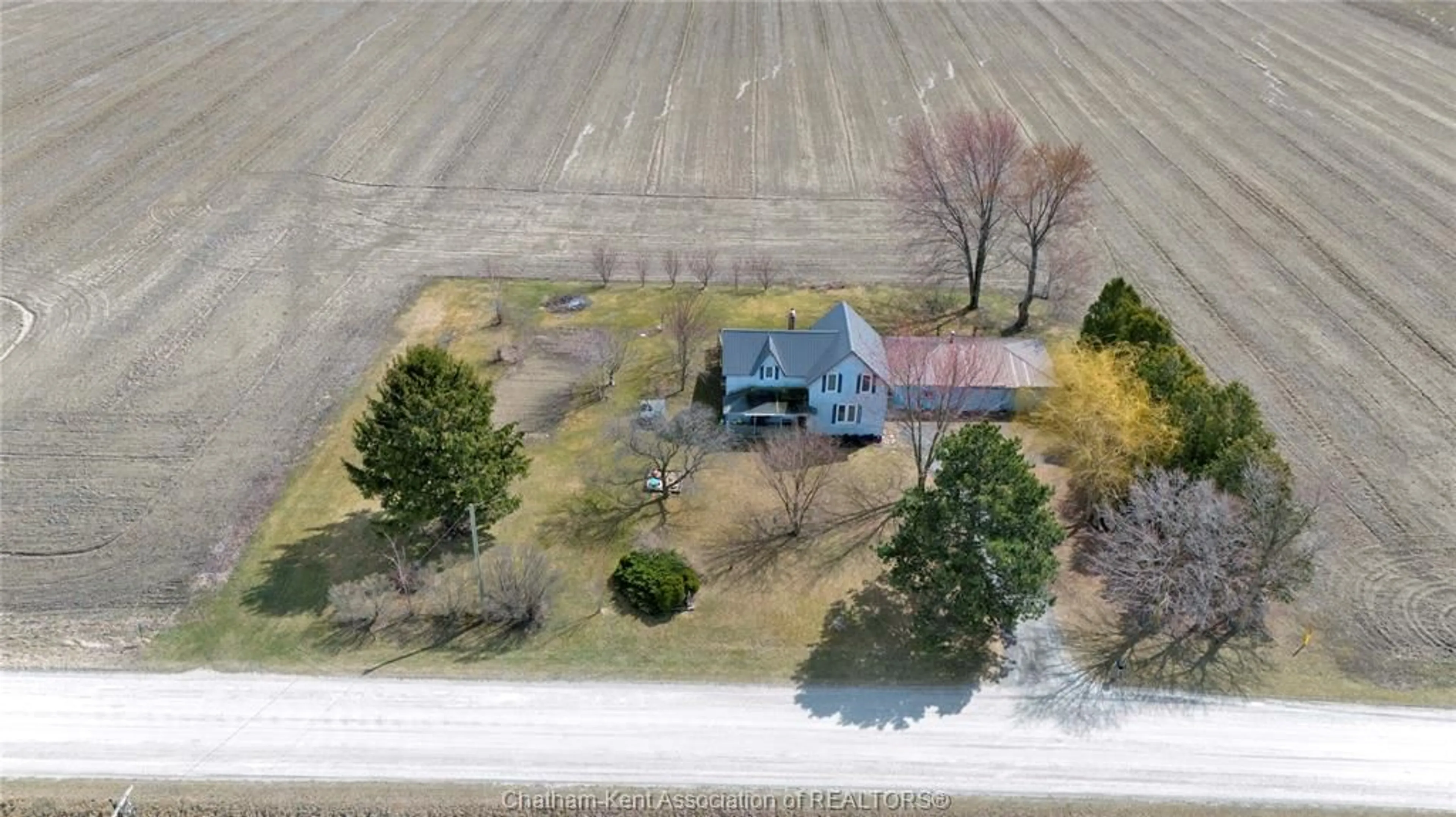 A pic from outside/outdoor area/front of a property/back of a property/a pic from drone, unknown for 10234 Cedar Hedge Line, Dresden Ontario N0P 1M0