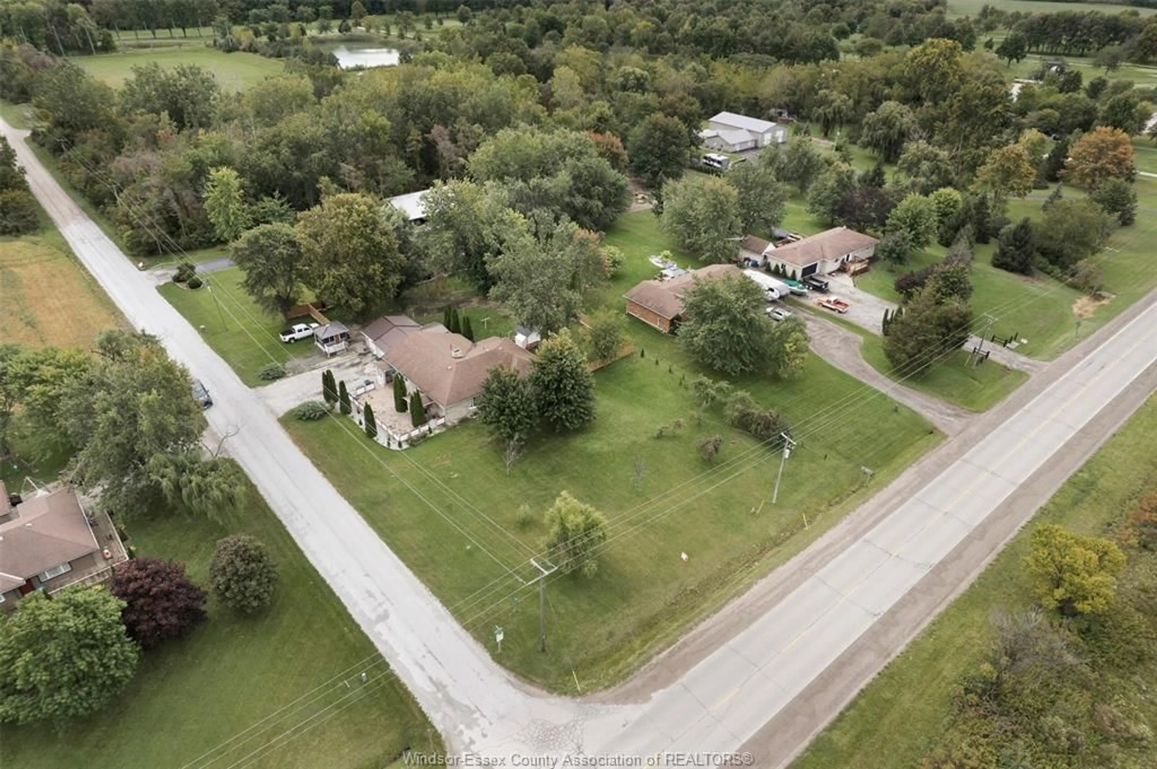 A pic from outside/outdoor area/front of a property/back of a property/a pic from drone, unknown for 21240 CEMETERY Rd, Wheatley Ontario N0P 2P0