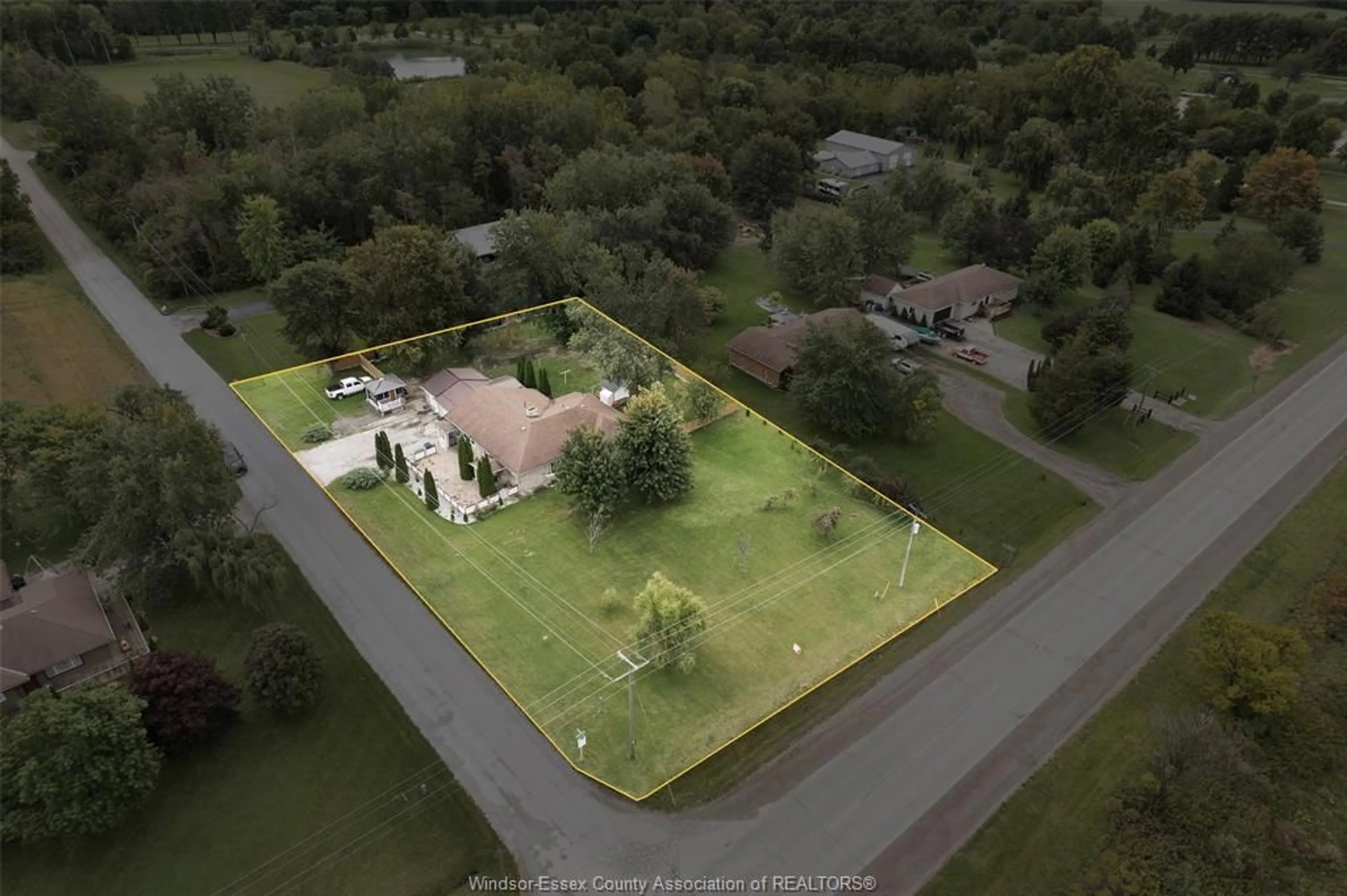 A pic from outside/outdoor area/front of a property/back of a property/a pic from drone, unknown for 21240 CEMETERY Rd, Wheatley Ontario N0P 2P0