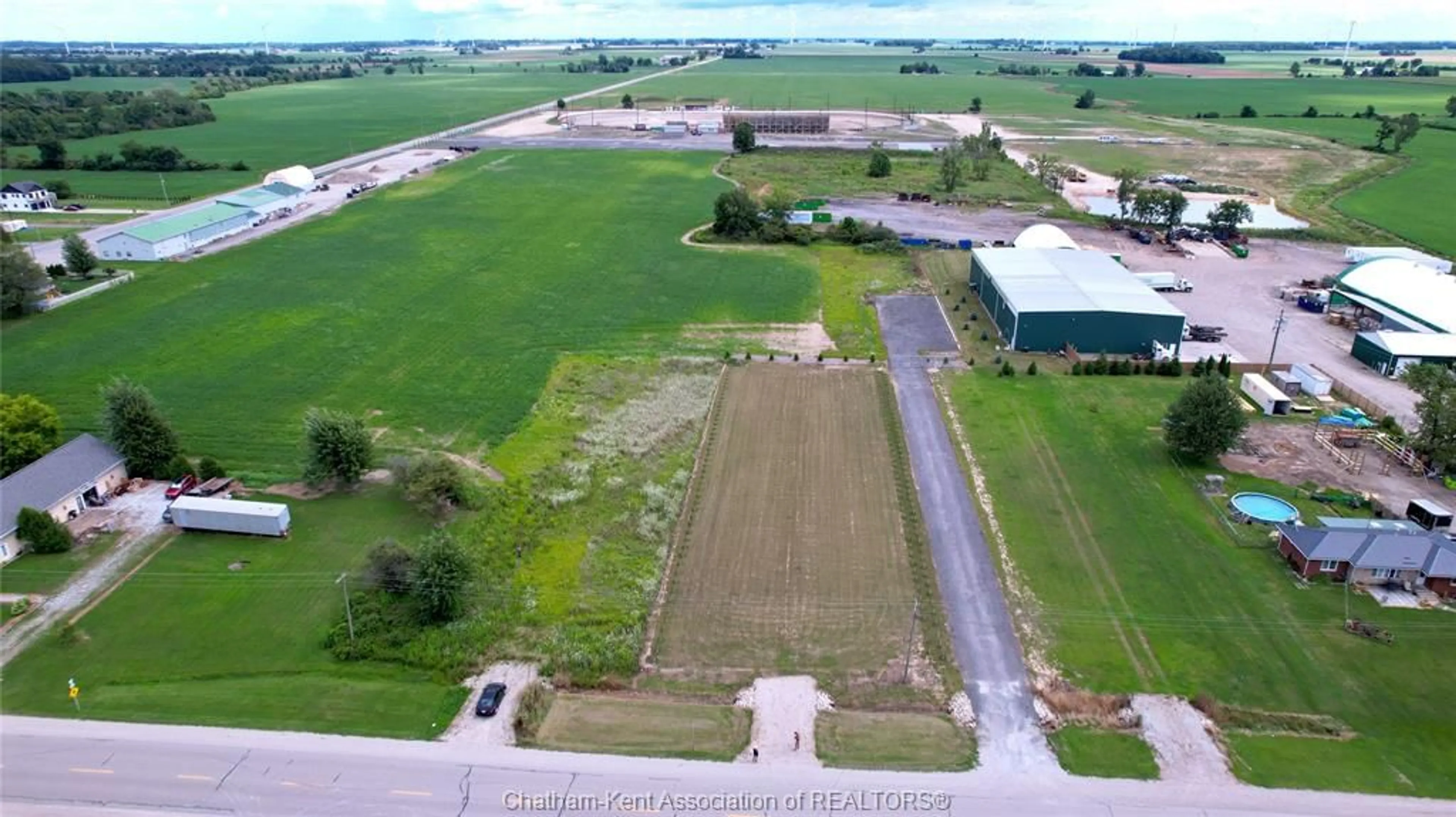 A pic from outside/outdoor area/front of a property/back of a property/a pic from drone, building for 6604 Middle Line, South Buxton Ontario N0P1W0