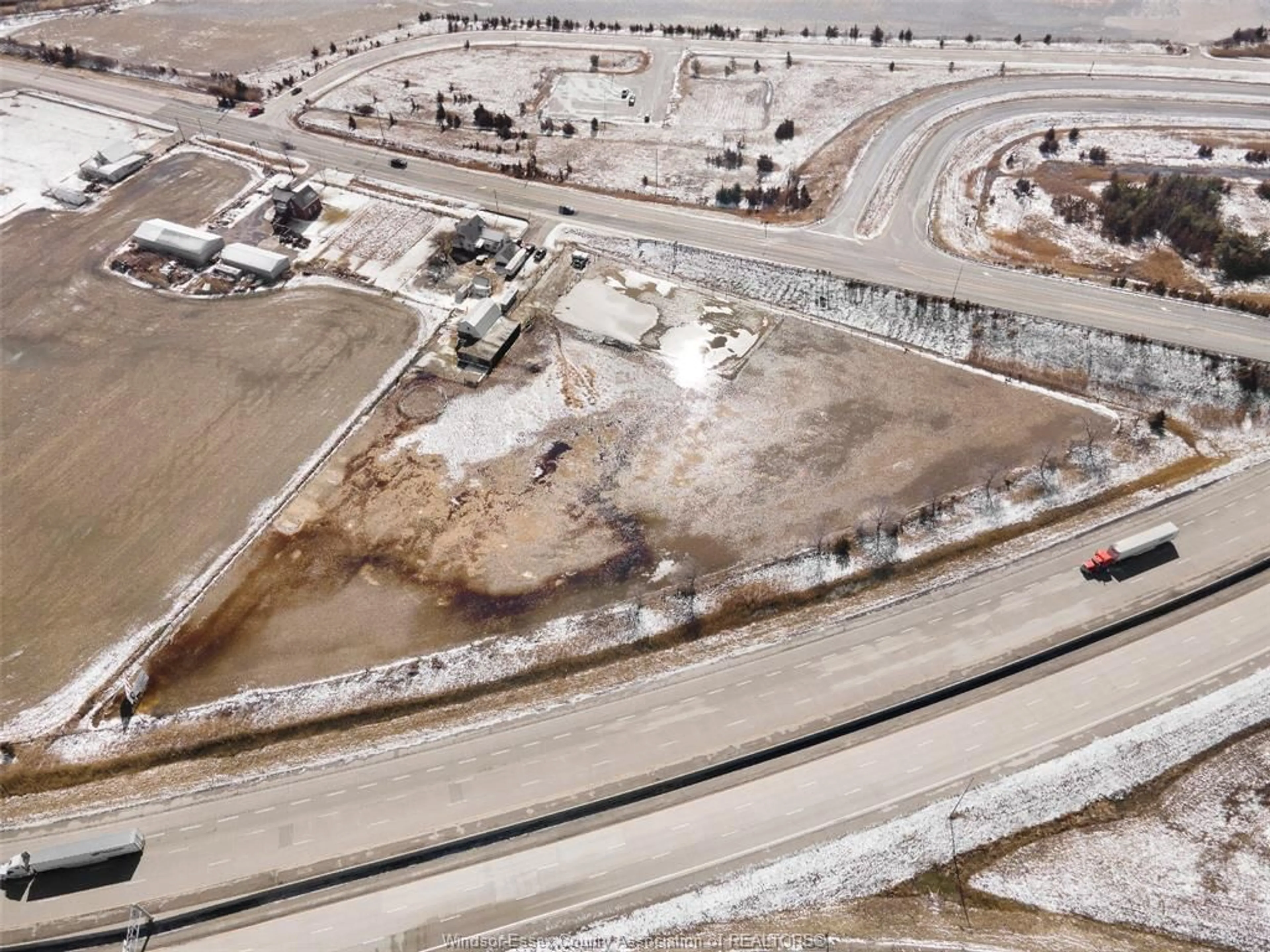 A pic from outside/outdoor area/front of a property/back of a property/a pic from drone, street for 20100 COUNTY RD 42, Tilbury North Ontario N0P 2L0