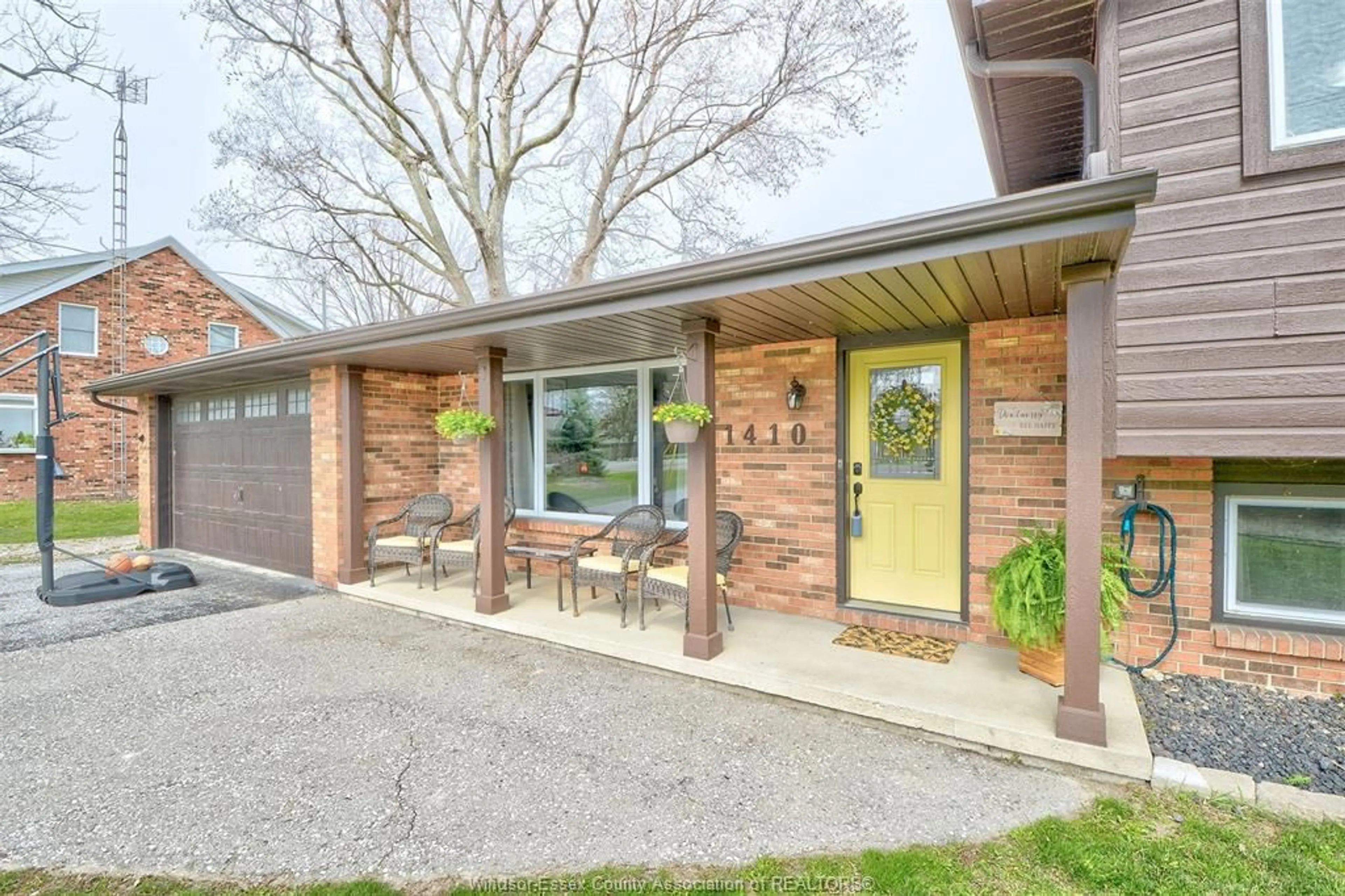 Home with brick exterior material, street for 1410 COUNTY RD 22, Lakeshore Ontario N8L 0H9