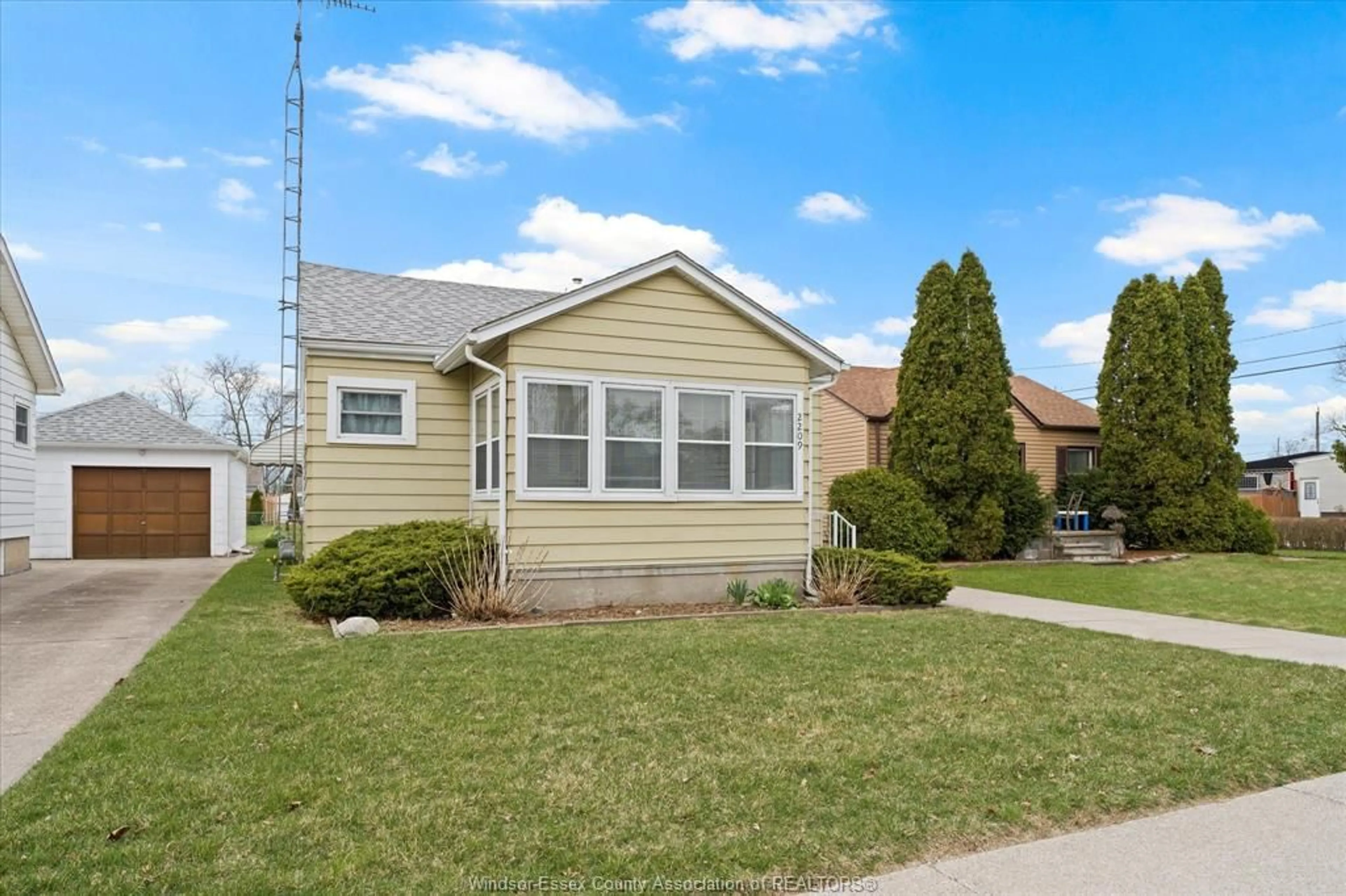 Home with vinyl exterior material, street for 2209 PARENT, Windsor Ontario N8W 2E4