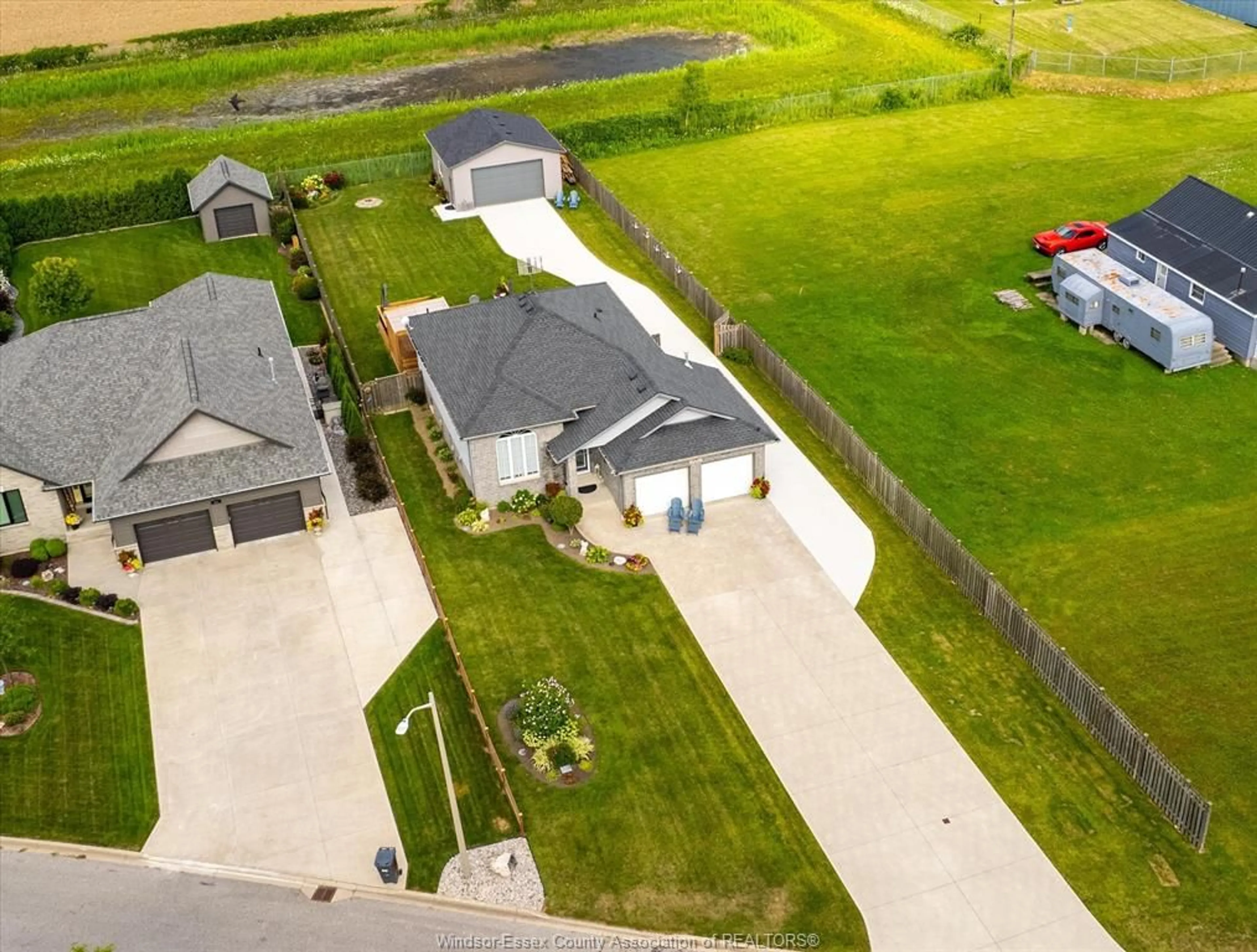A pic from outside/outdoor area/front of a property/back of a property/a pic from drone, street for 247 COLUMBUS Dr, Stoney Point Ontario N0R 1N0