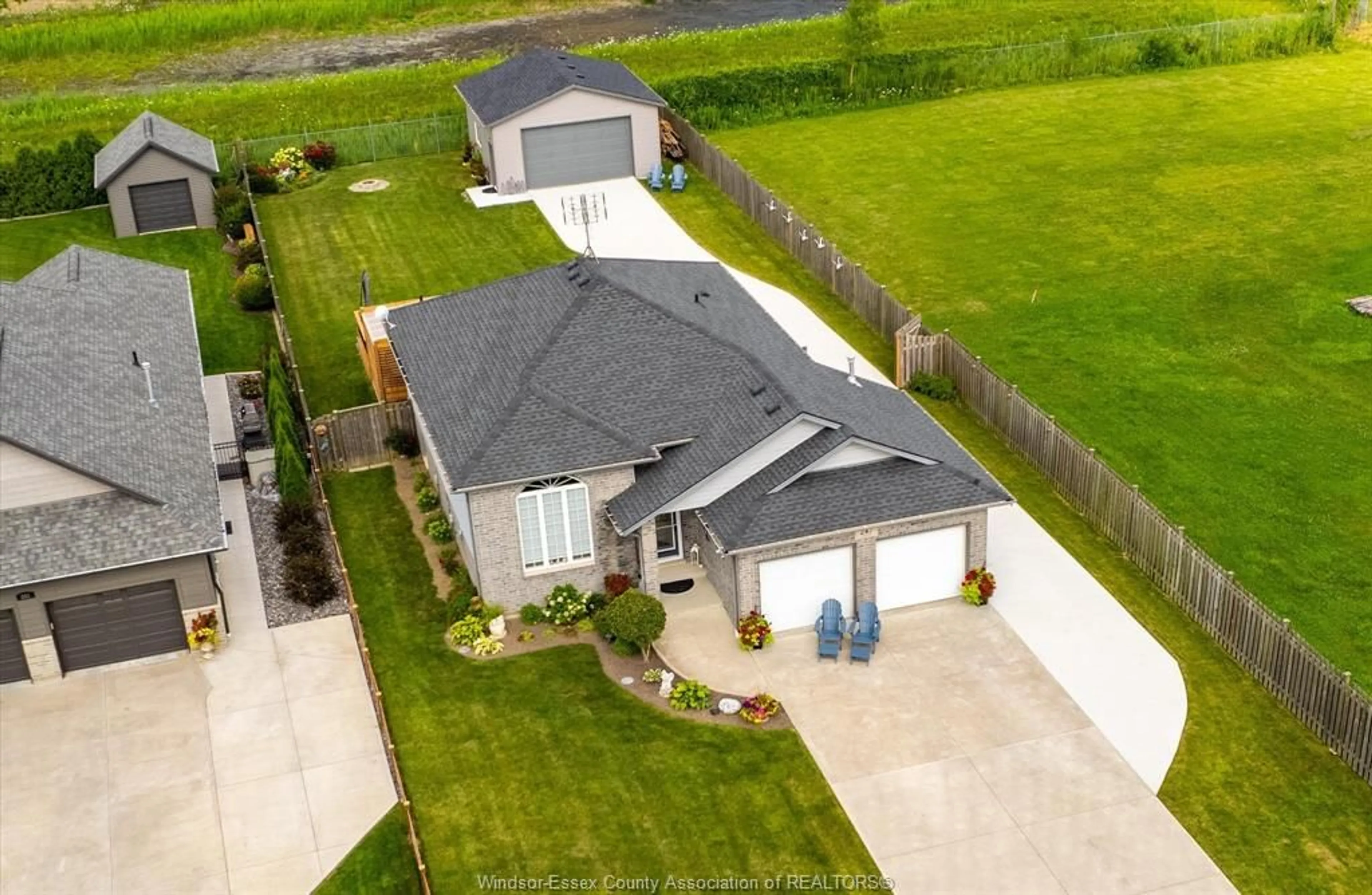 A pic from outside/outdoor area/front of a property/back of a property/a pic from drone, street for 247 COLUMBUS Dr, Stoney Point Ontario N0R 1N0