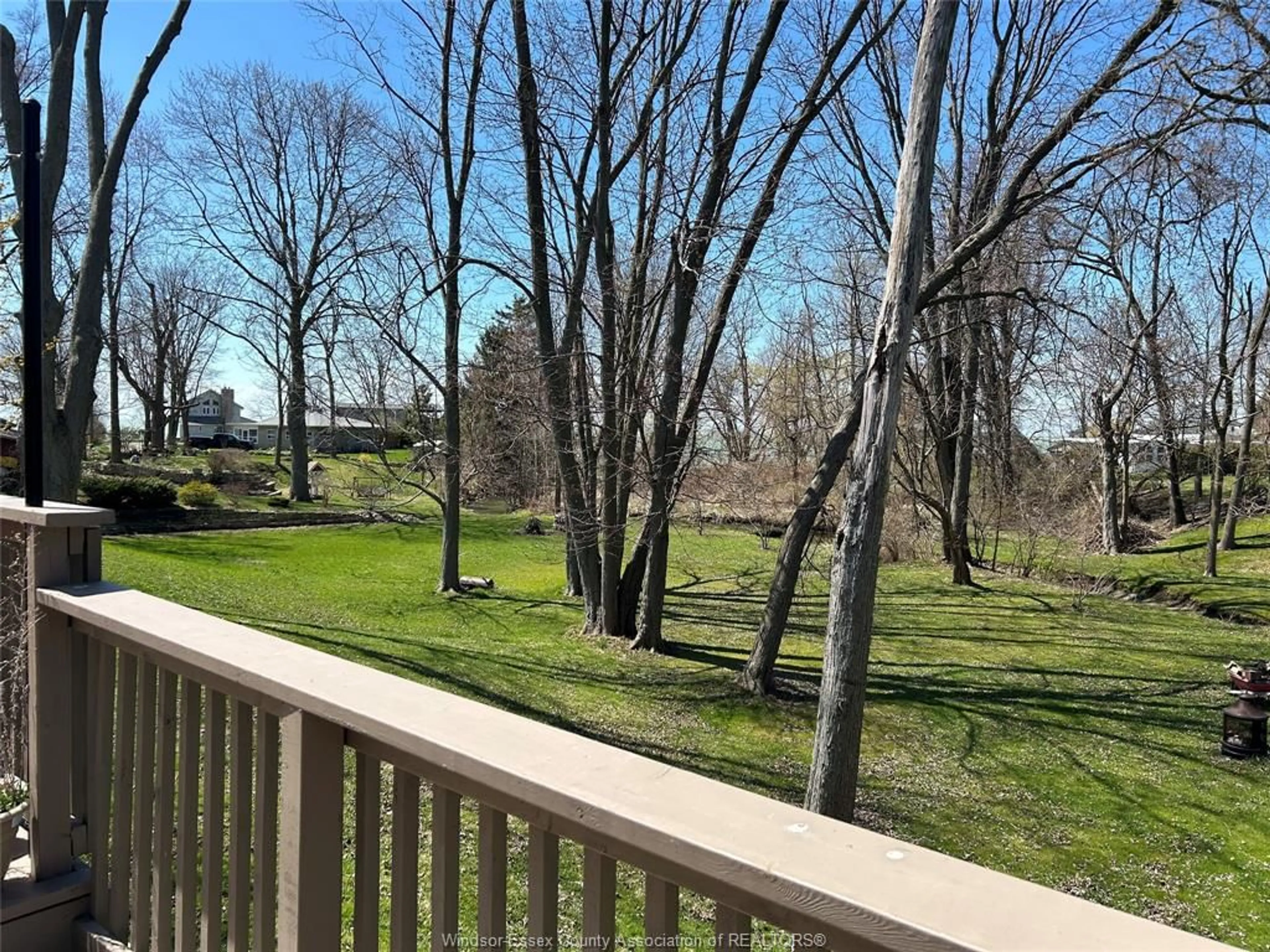A pic from outside/outdoor area/front of a property/back of a property/a pic from drone, forest/trees view for 123 DAHINDA Dr, Colchester Ontario N0R 1G0