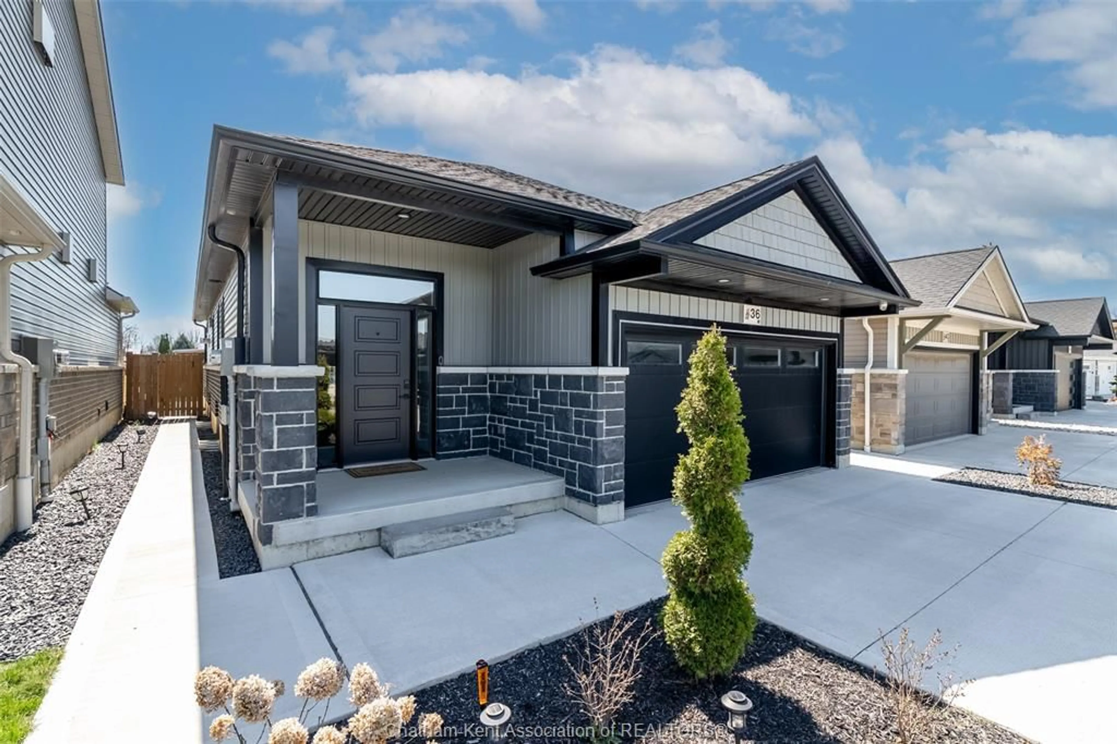 Home with brick exterior material, street for 36 Cabot Trail, Chatham Ontario N7L 0A4
