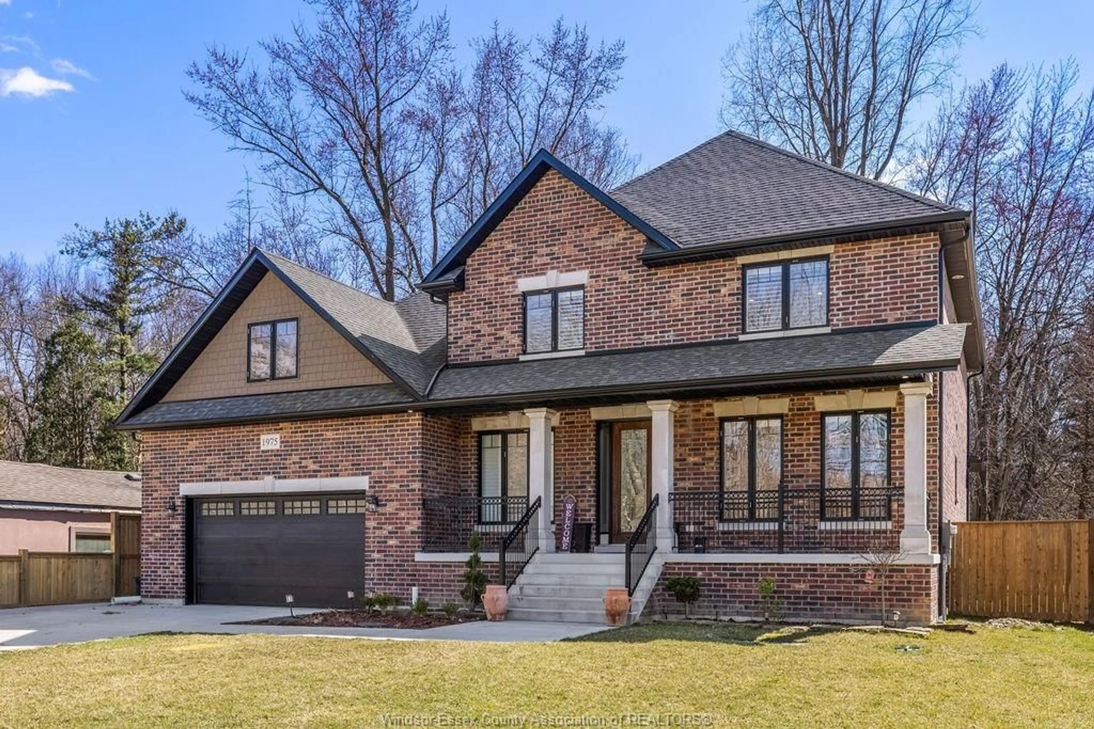 Home with brick exterior material, street for 1975 LANSING St, Windsor Ontario N9E 3S4