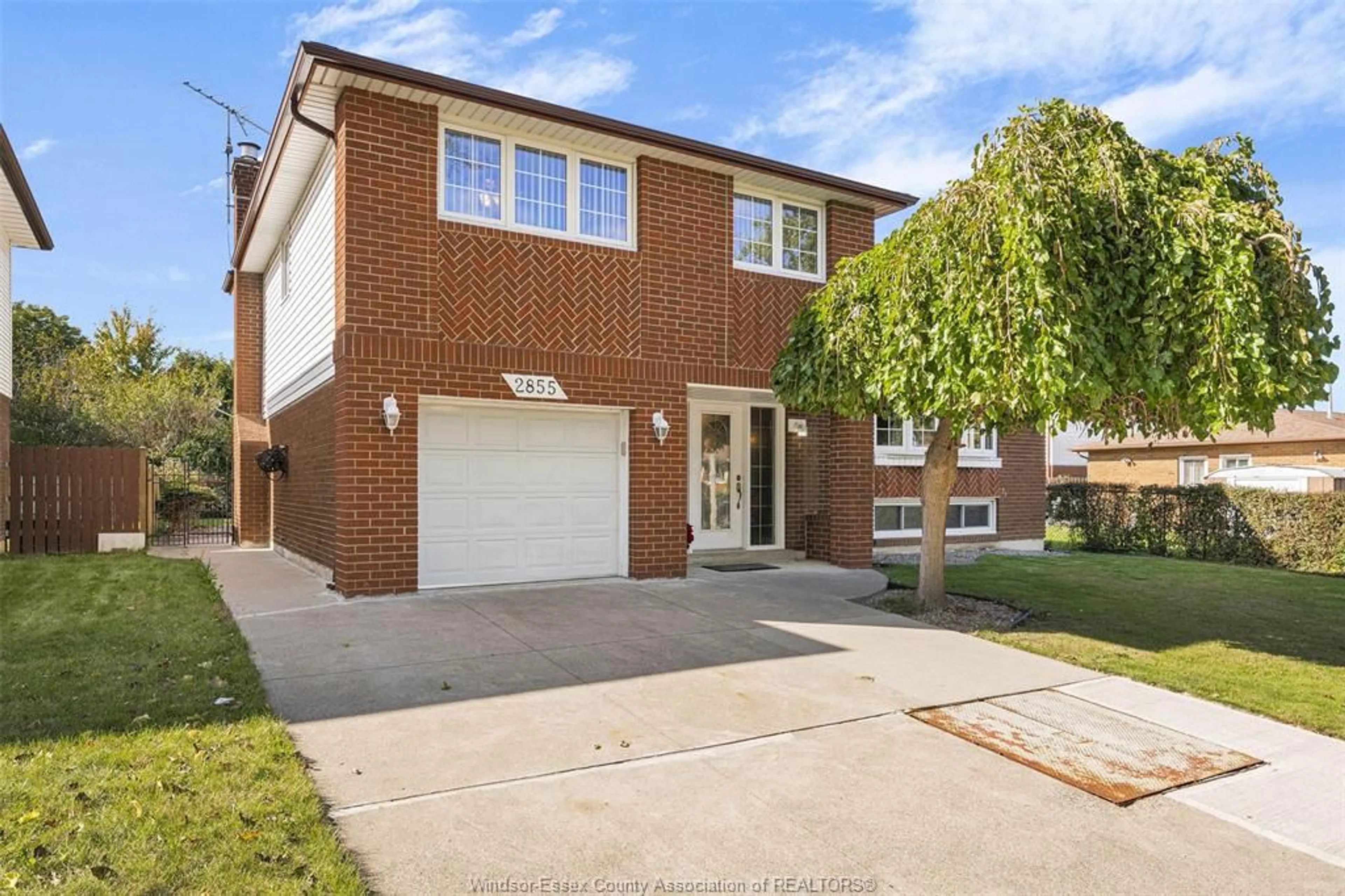 Home with brick exterior material, street for 2855 FOREST GLADE Dr, Windsor Ontario N8R 1L4