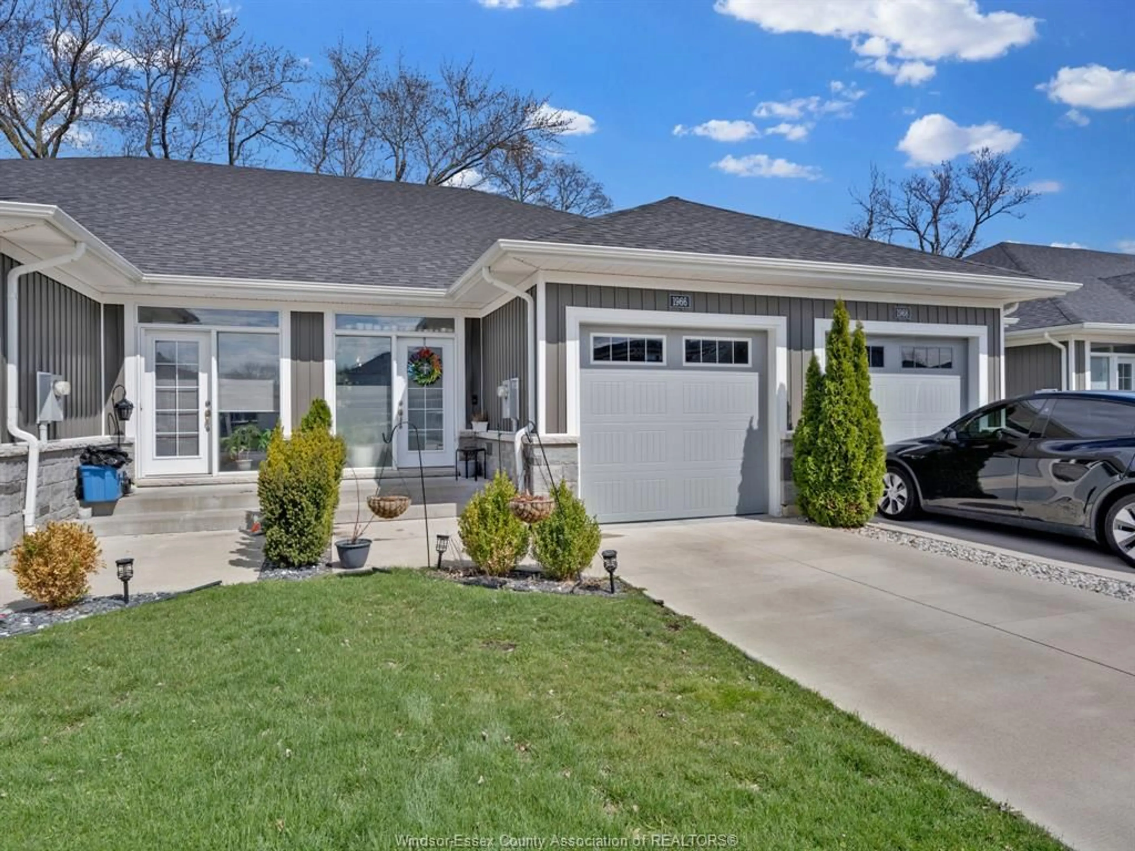 Home with vinyl exterior material, street for 1966 Ethan Crt, Windsor Ontario N8T 0B3