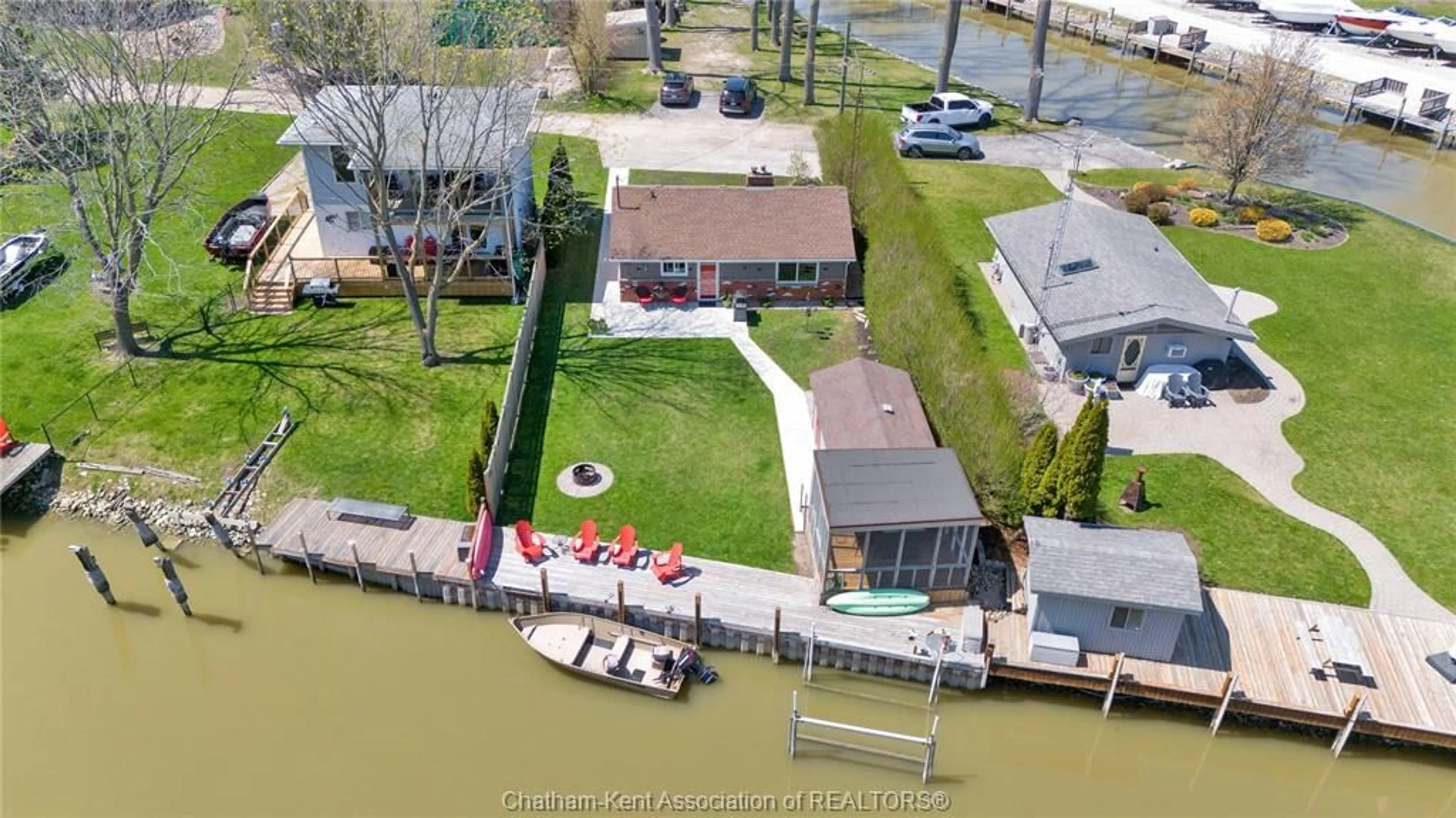 A pic from outside/outdoor area/front of a property/back of a property/a pic from drone, water/lake/river/ocean view for 21465 MUSKIE Lane, Lighthouse Cove Ontario N0P 2L0