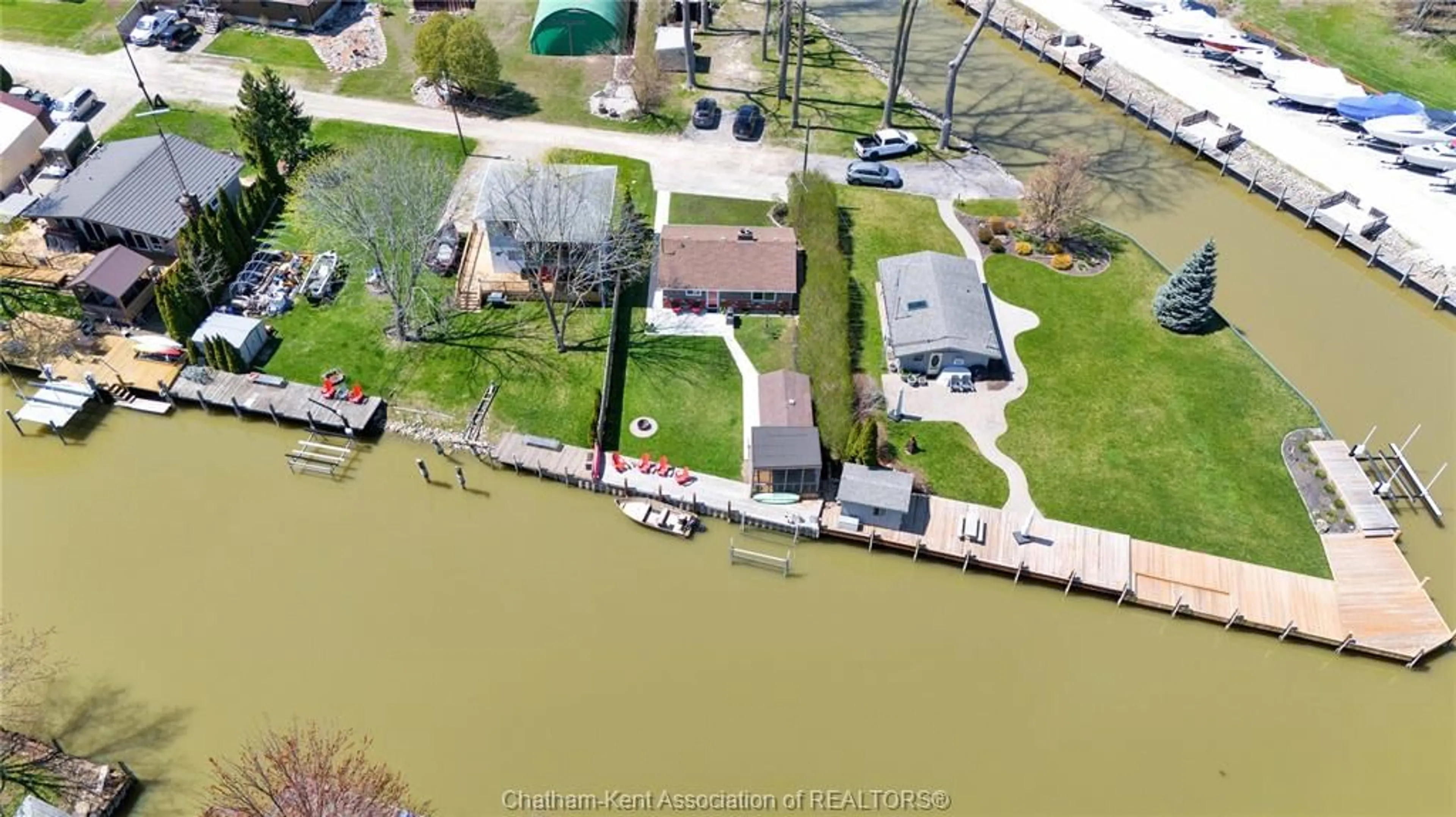 A pic from outside/outdoor area/front of a property/back of a property/a pic from drone, water/lake/river/ocean view for 21465 MUSKIE Lane, Lighthouse Cove Ontario N0P 2L0