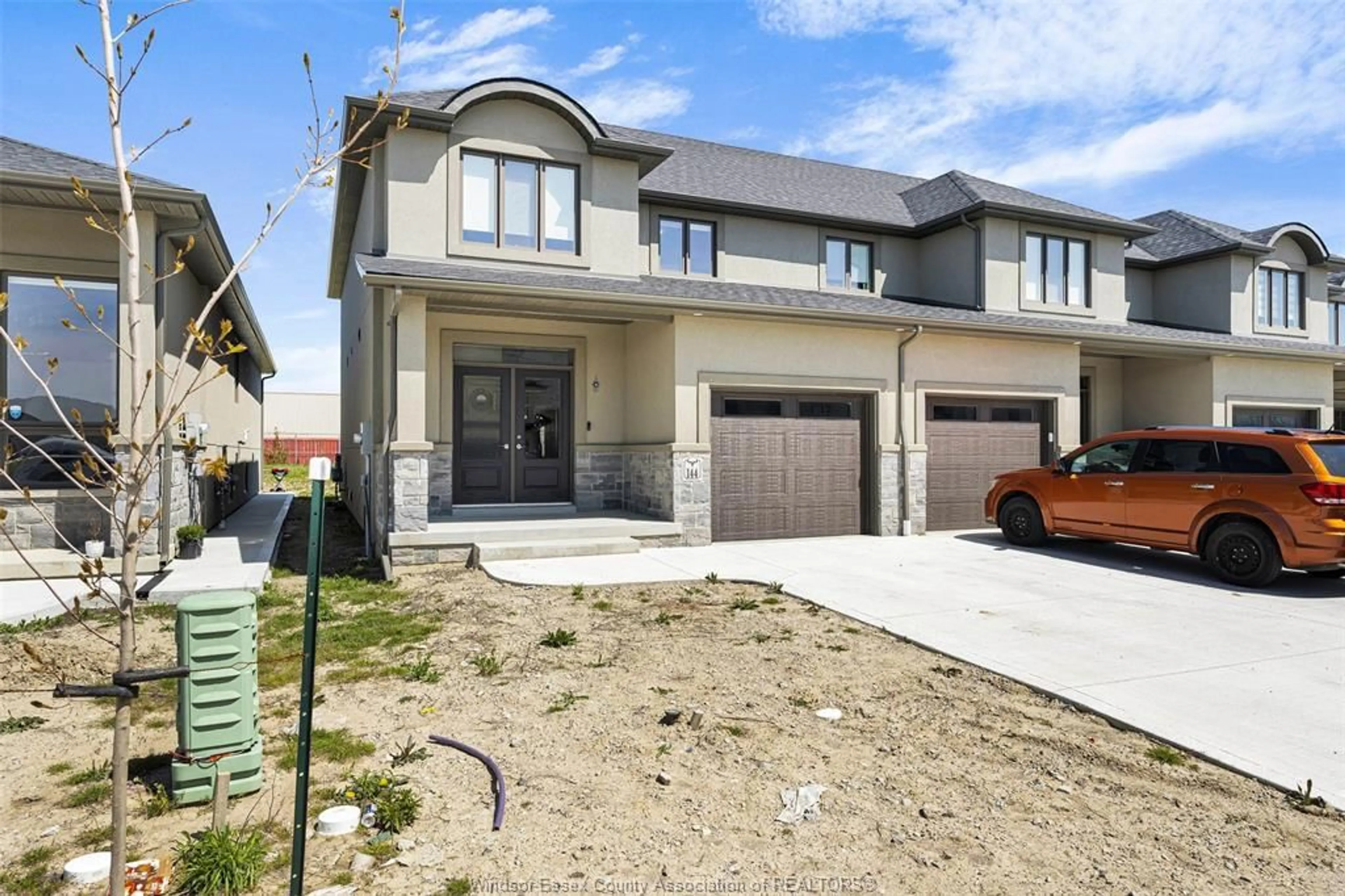 Home with brick exterior material, street for 144 LANE St, Essex Ontario N8M 1B2
