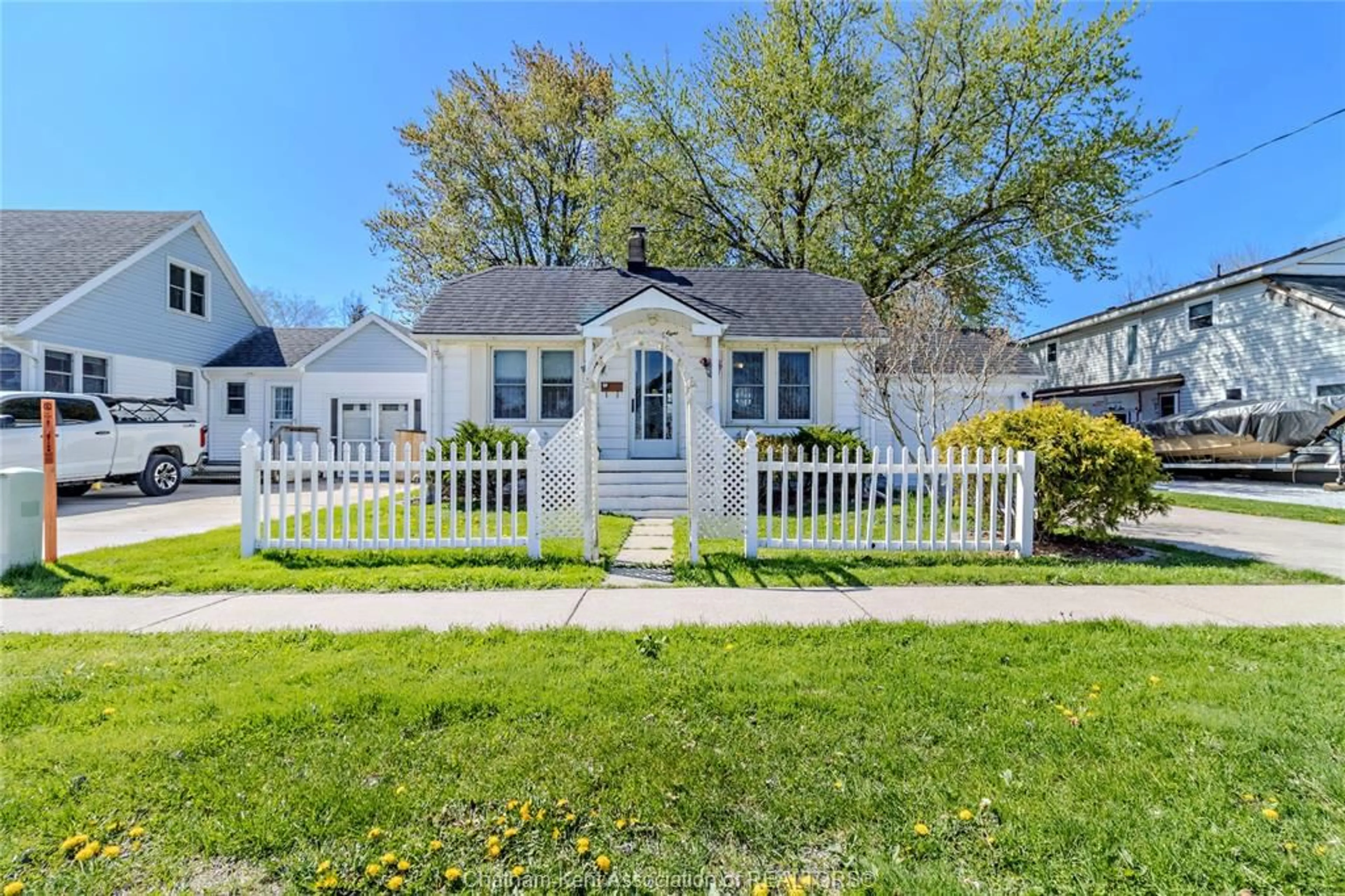 Home with vinyl exterior material, street for 408 St. Charles St, Belle River Ontario N0R 1A0
