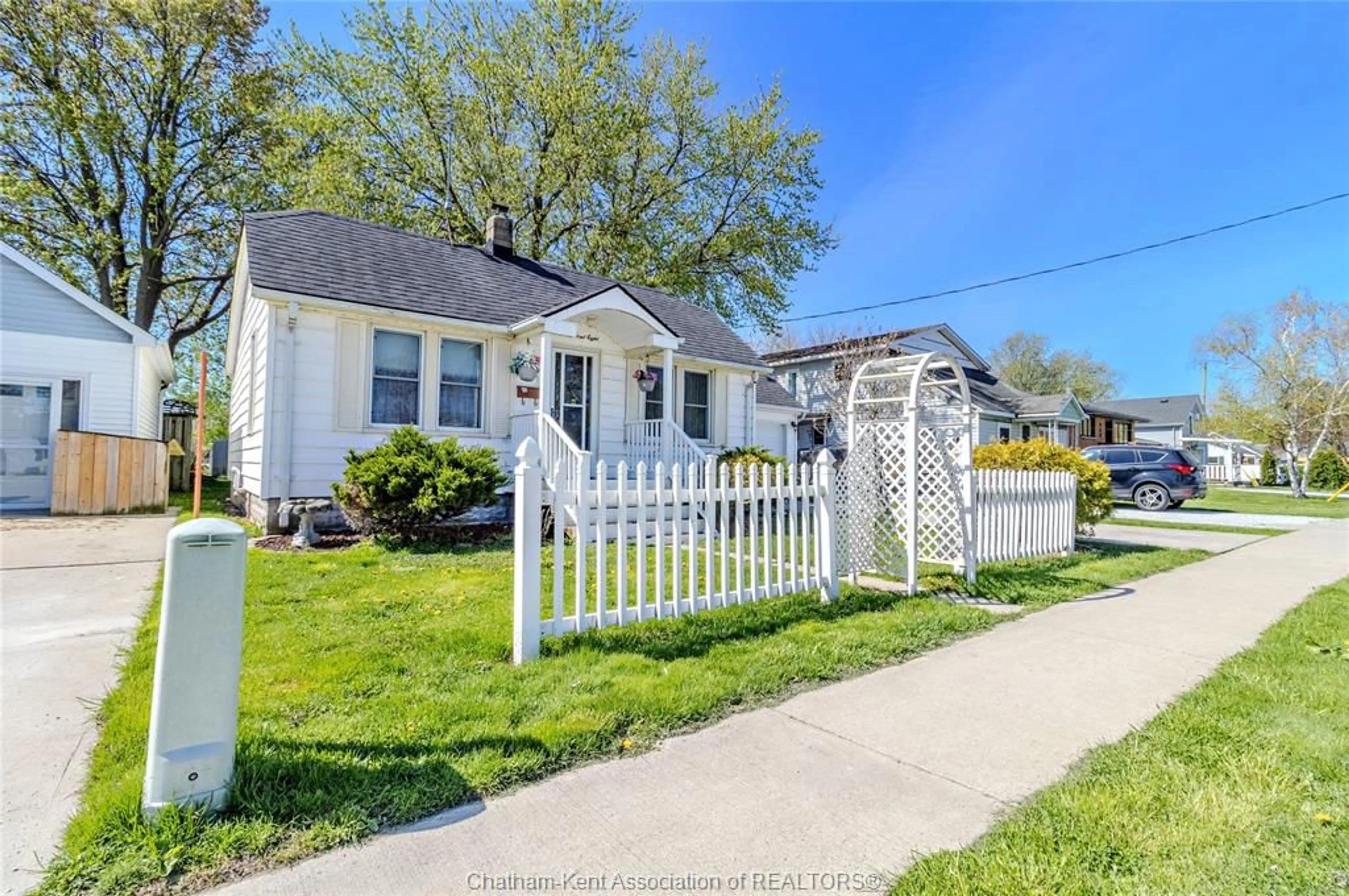 Home with vinyl exterior material, street for 408 St. Charles St, Belle River Ontario N0R 1A0