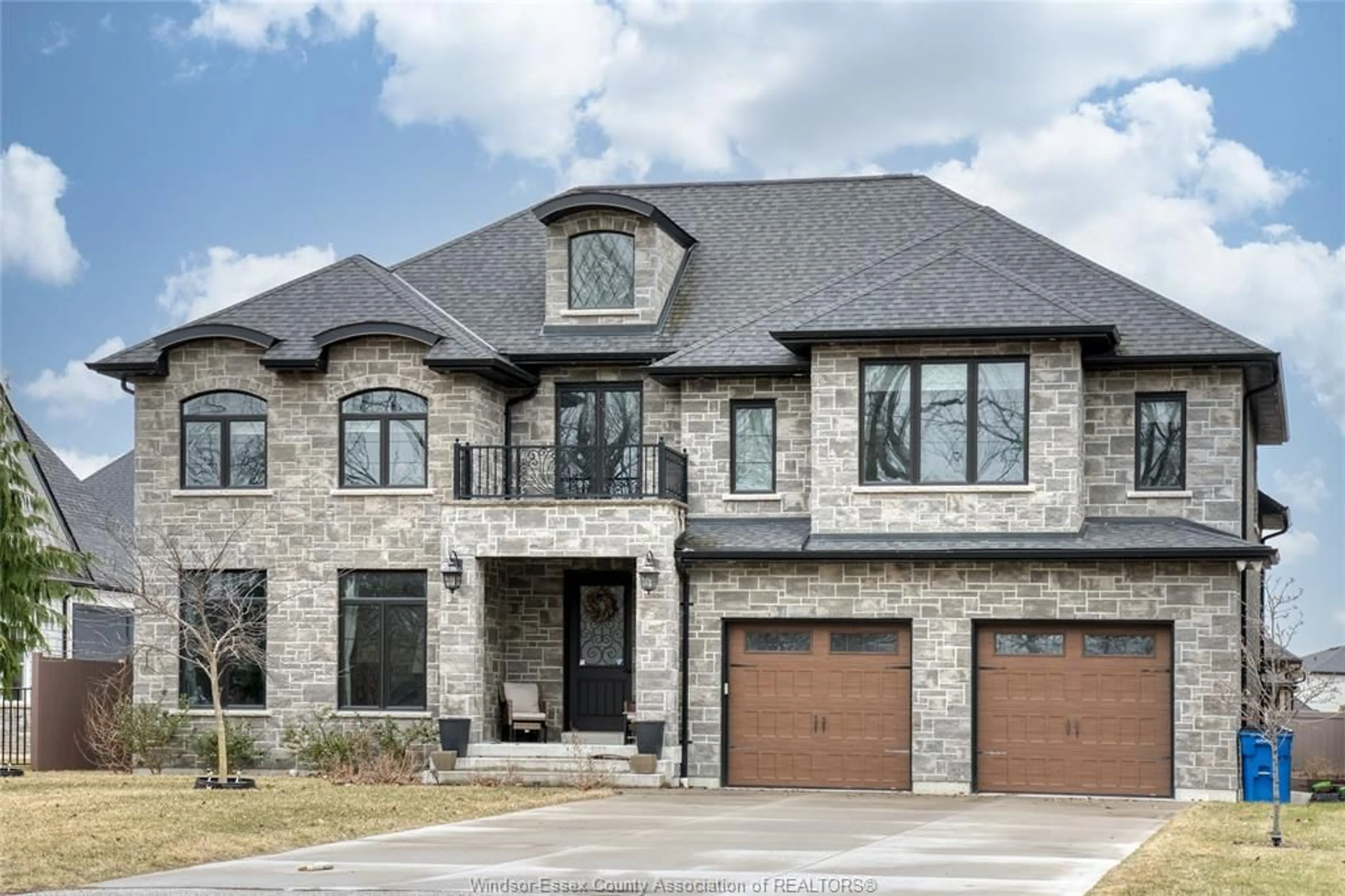 Home with brick exterior material, street for 695 OLD TECUMSEH, Lakeshore Ontario N0R 1A0