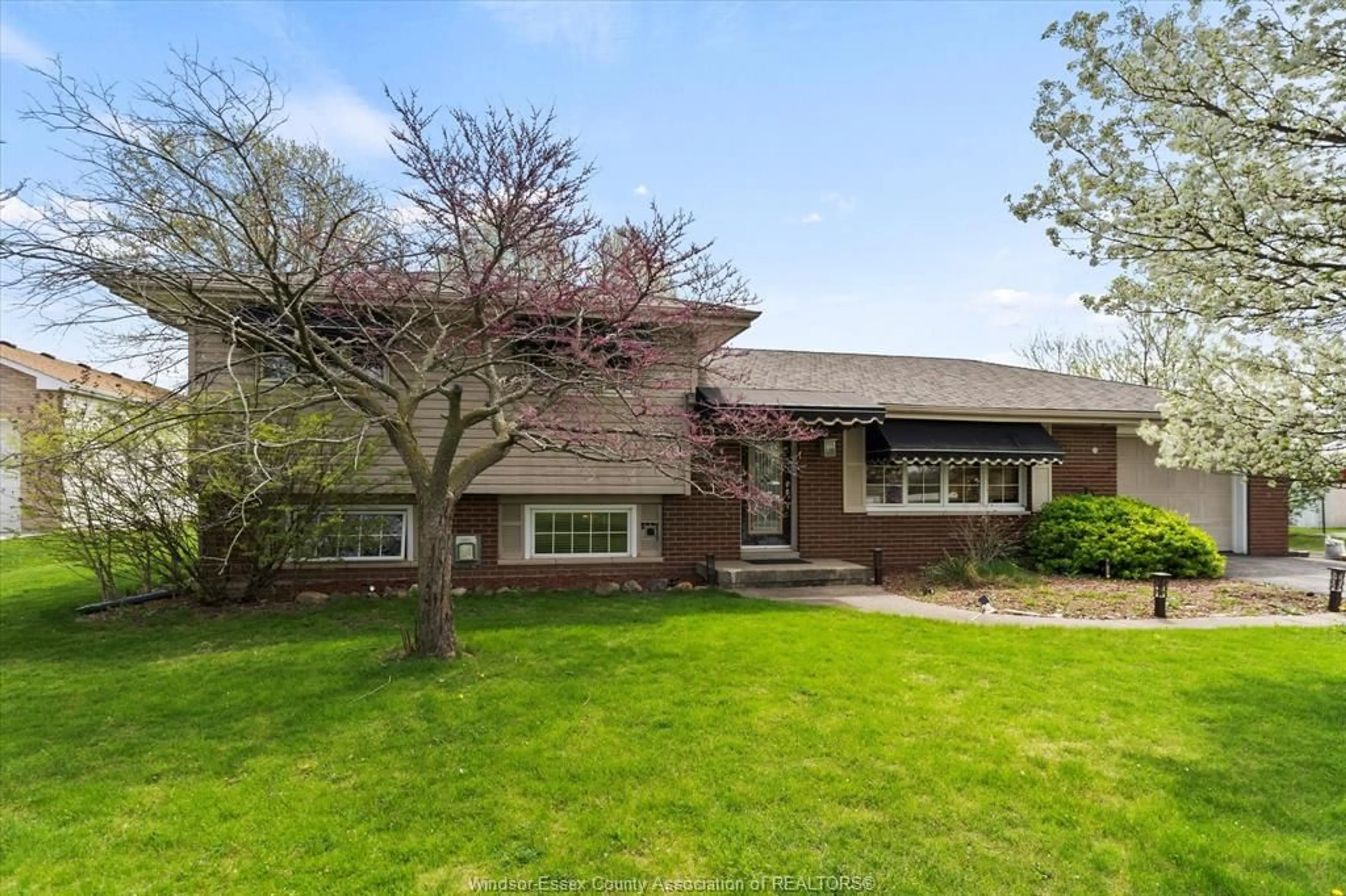 Home with brick exterior material, street for 3446 MANNING Rd, Lakeshore Ontario N0R 1K0