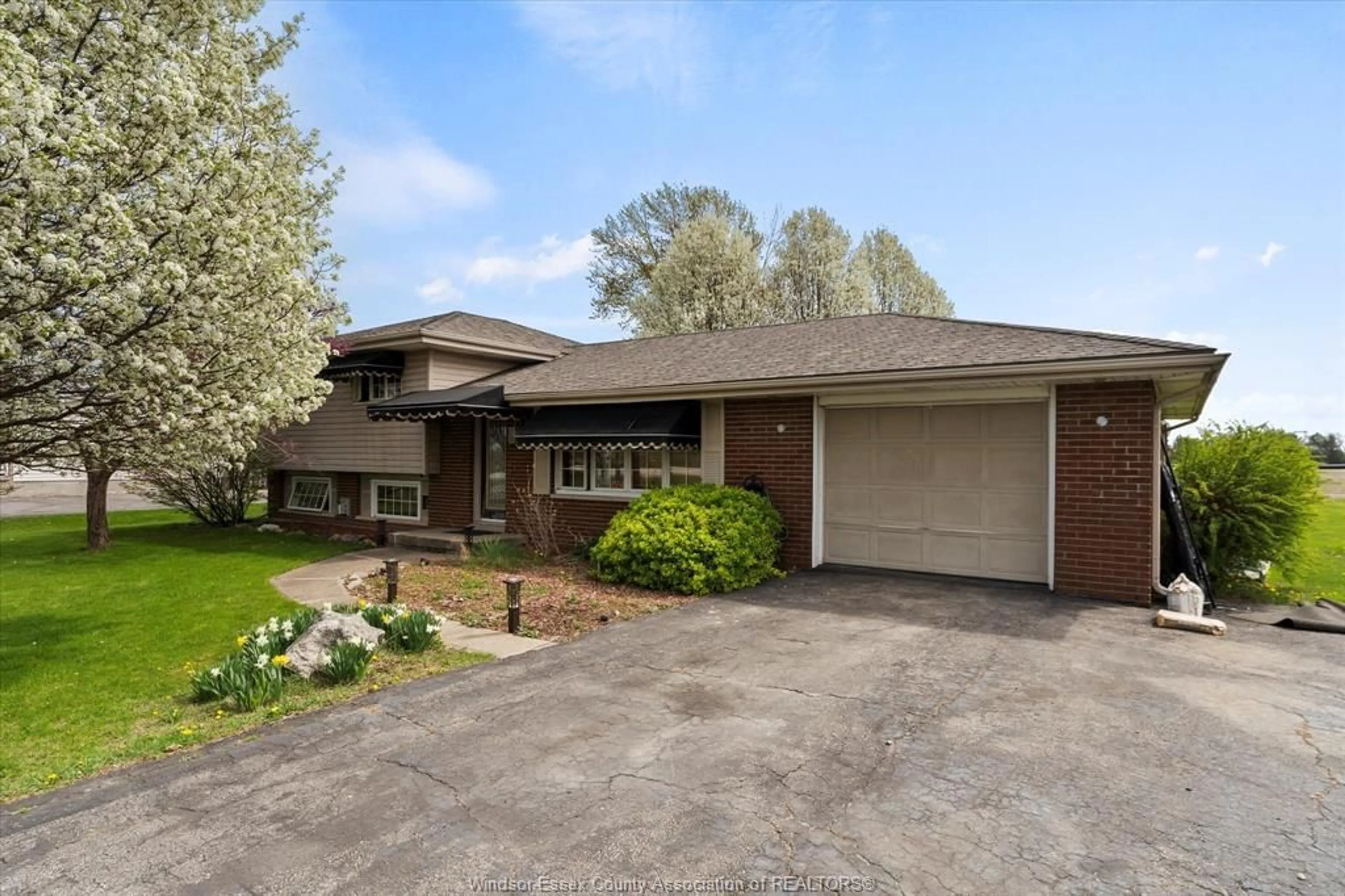 Home with brick exterior material, street for 3446 MANNING Rd, Lakeshore Ontario N0R 1K0