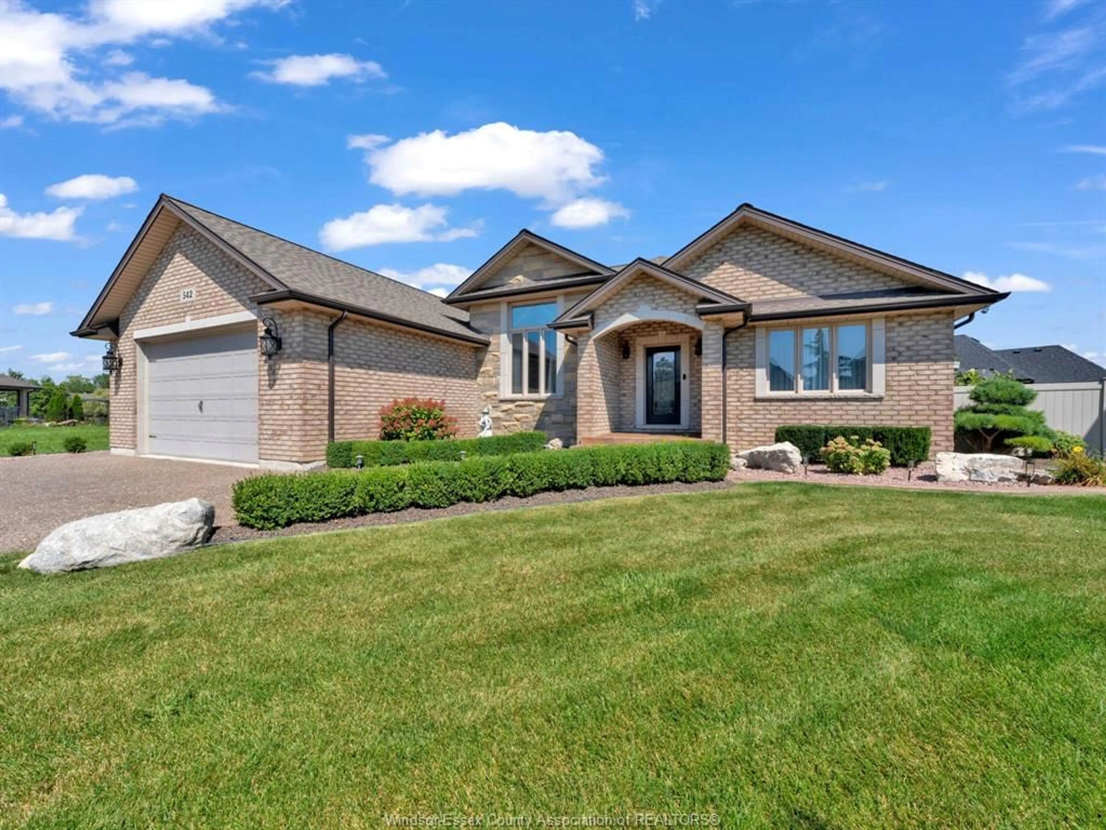 Home with brick exterior material, street for 542 RIVER DOWNS, Lakeshore Ontario N0R 1A0