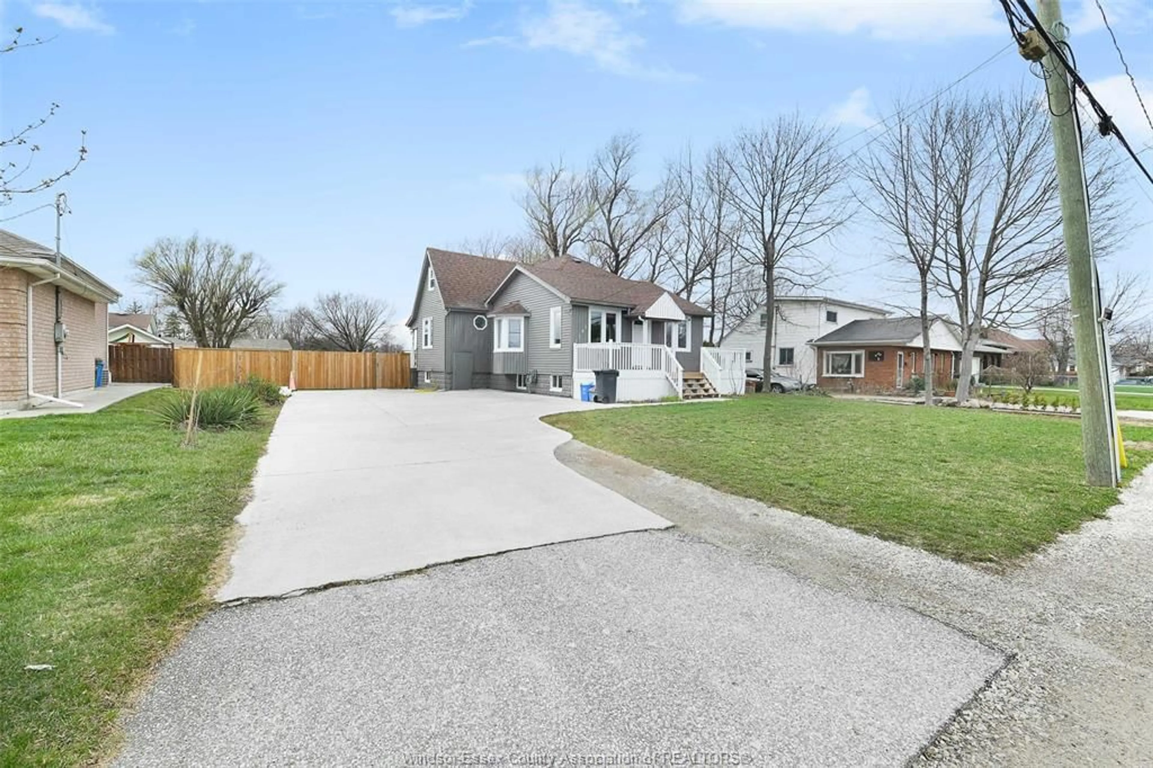 A pic from outside/outdoor area/front of a property/back of a property/a pic from drone, street for 1797 LESPERANCE Rd, Tecumseh Ontario N8N 1Y2