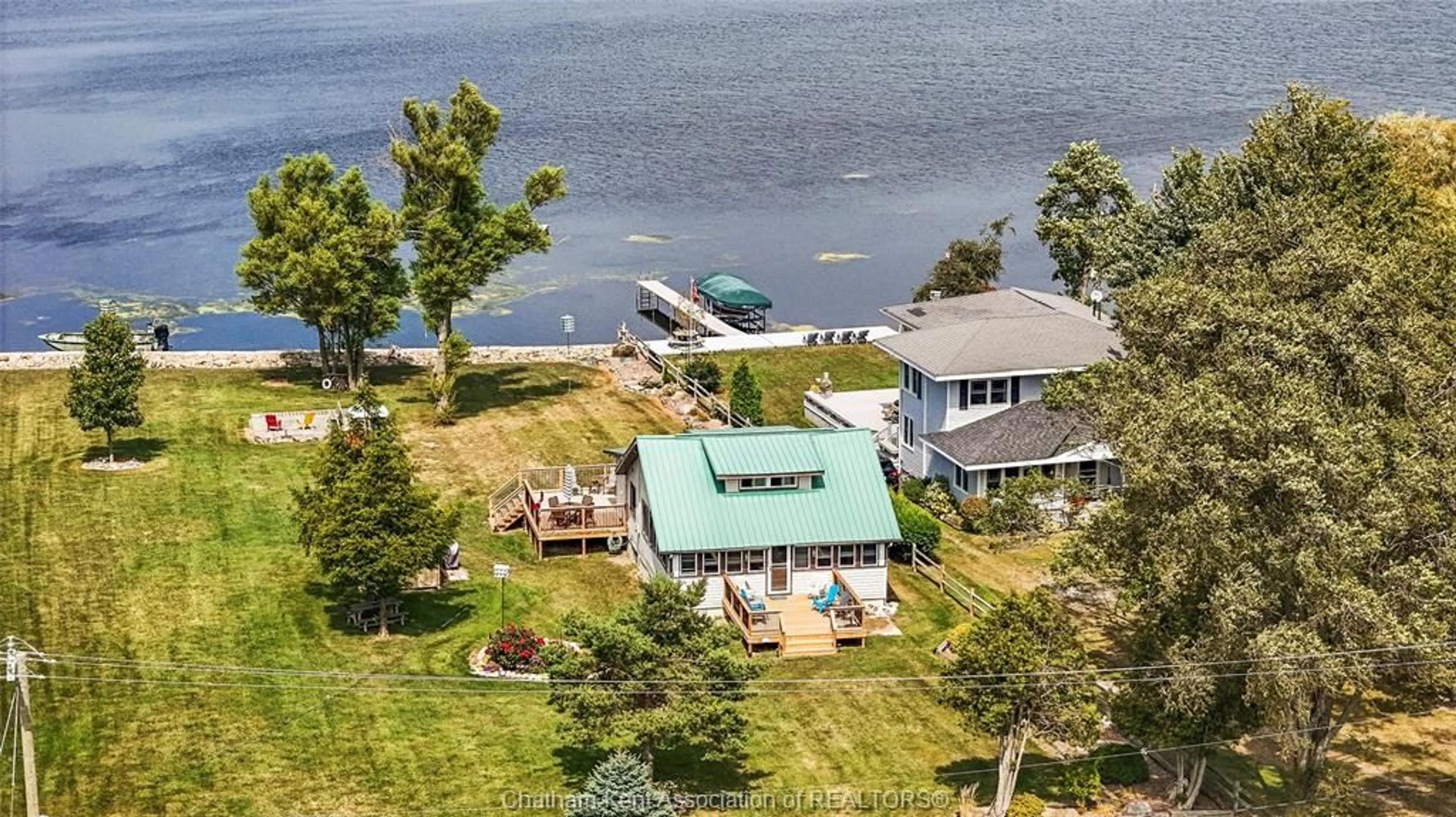 A pic from outside/outdoor area/front of a property/back of a property/a pic from drone, water/lake/river/ocean view for 120 ROSS Lane, Erieau Ontario N0P 1N0