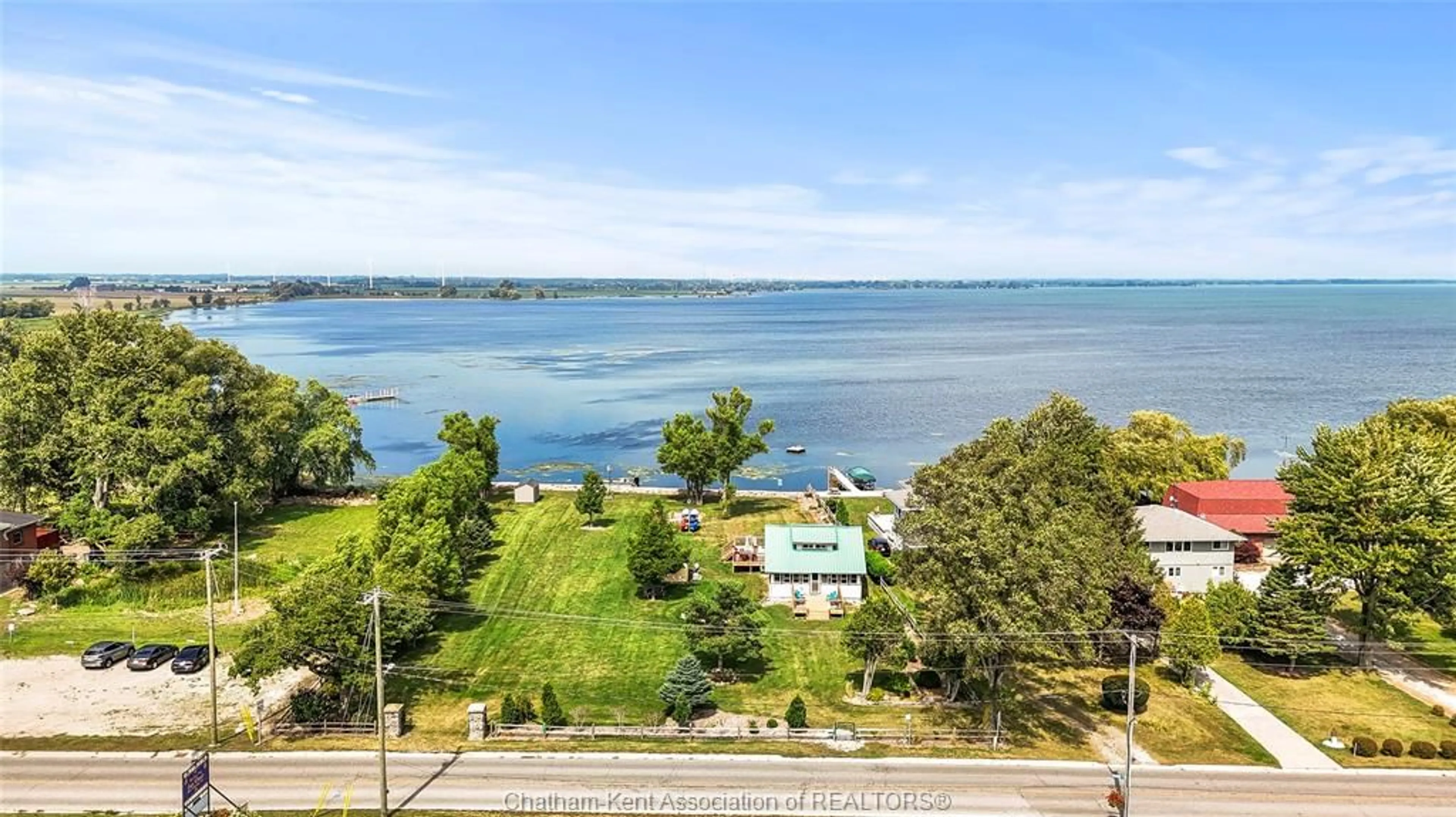 A pic from outside/outdoor area/front of a property/back of a property/a pic from drone, water/lake/river/ocean view for 120 ROSS Lane, Erieau Ontario N0P 1N0
