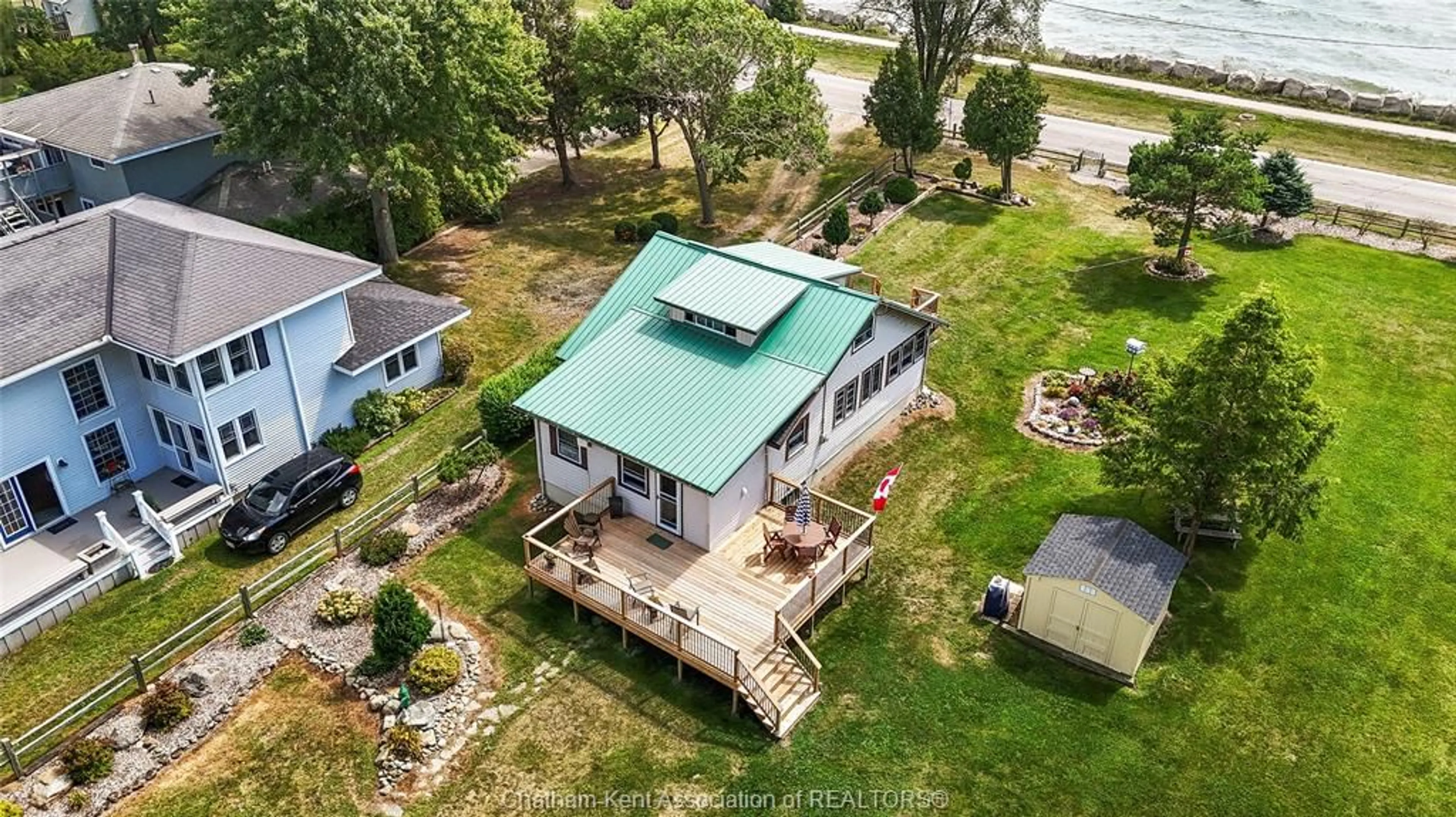 A pic from outside/outdoor area/front of a property/back of a property/a pic from drone, water/lake/river/ocean view for 120 ROSS Lane, Erieau Ontario N0P 1N0