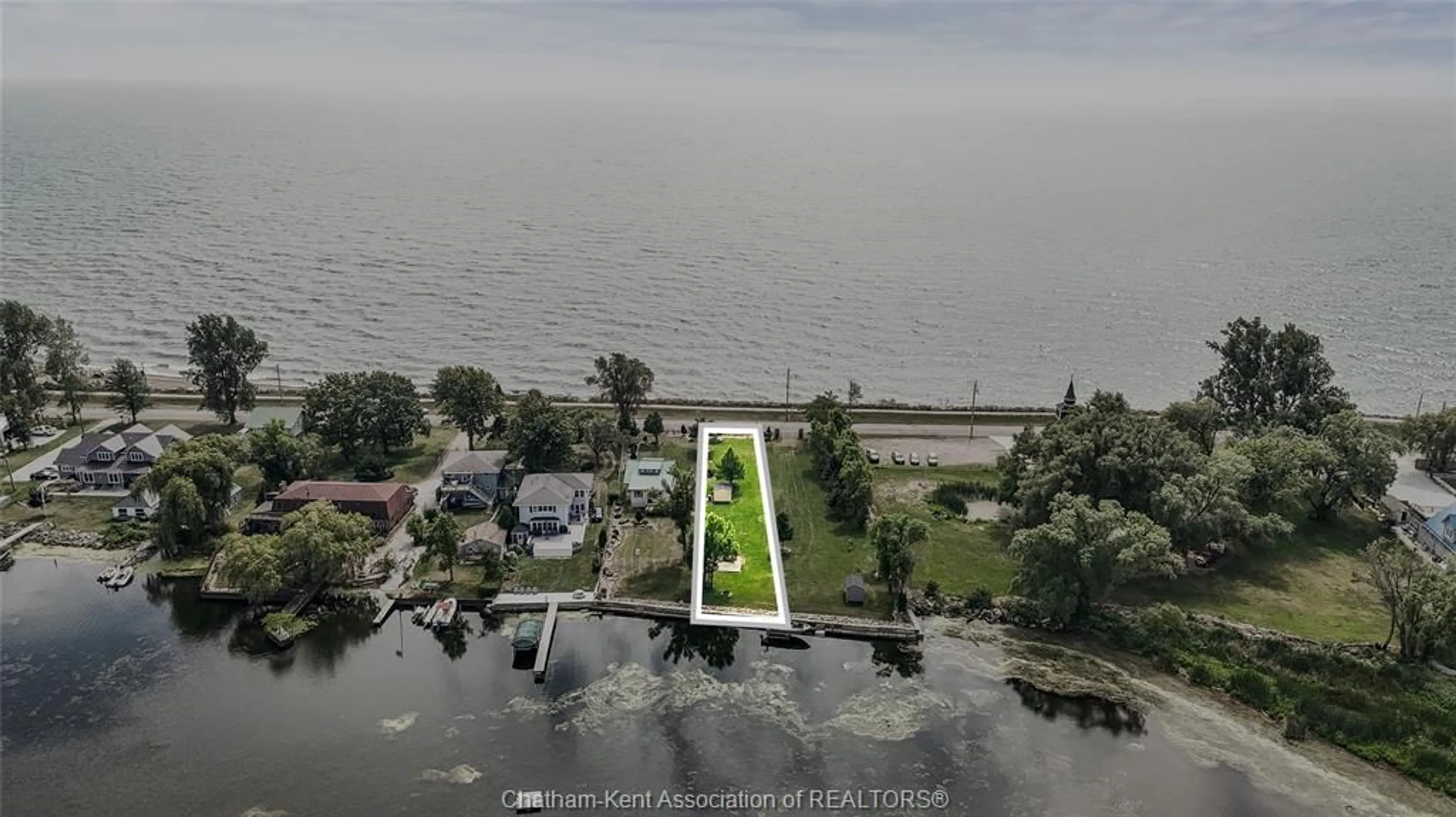 A pic from outside/outdoor area/front of a property/back of a property/a pic from drone, water/lake/river/ocean view for 110 ROSS Lane, Erieau Ontario N0P 1N0