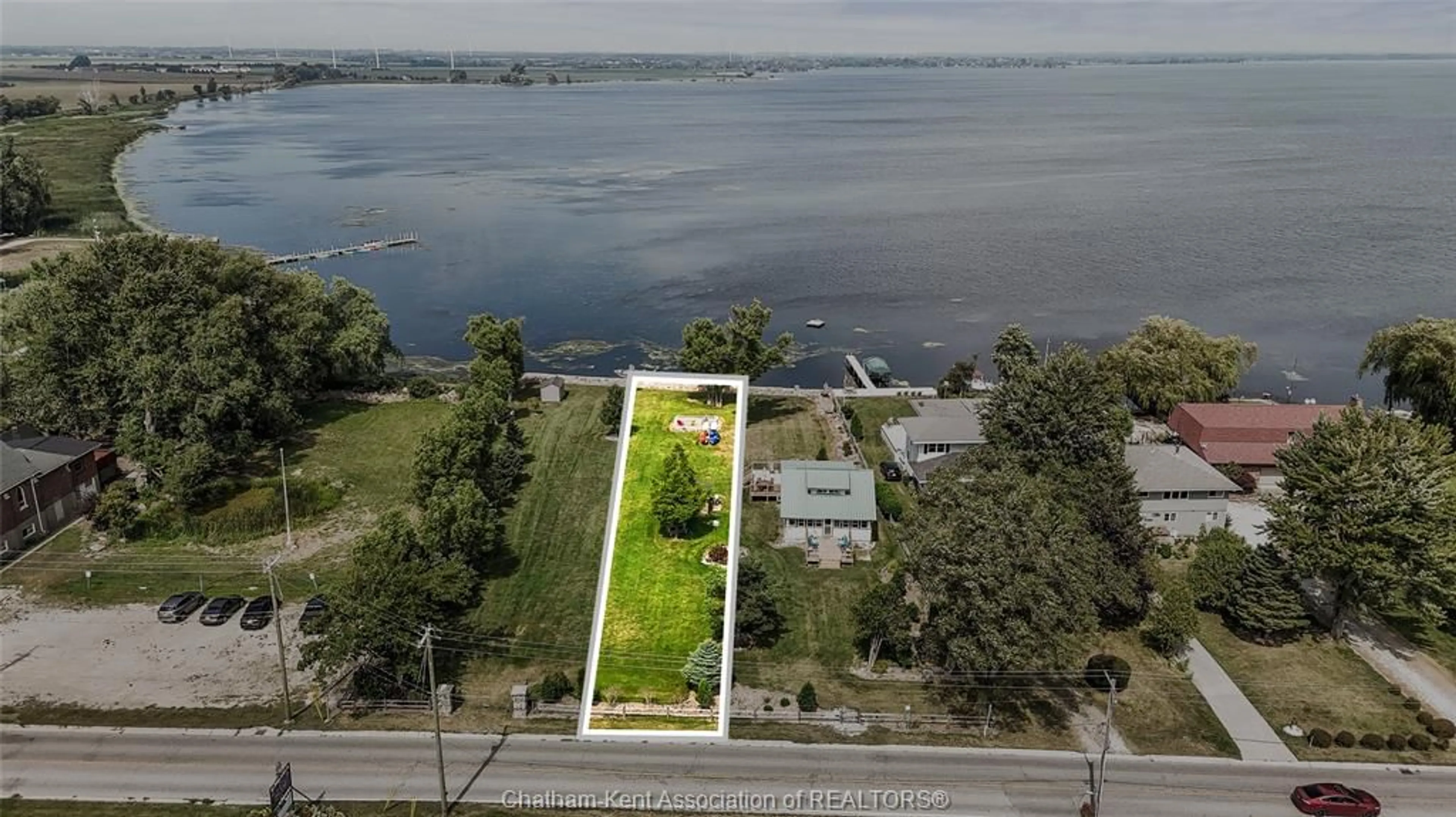 A pic from outside/outdoor area/front of a property/back of a property/a pic from drone, water/lake/river/ocean view for 110 ROSS Lane, Erieau Ontario N0P 1N0