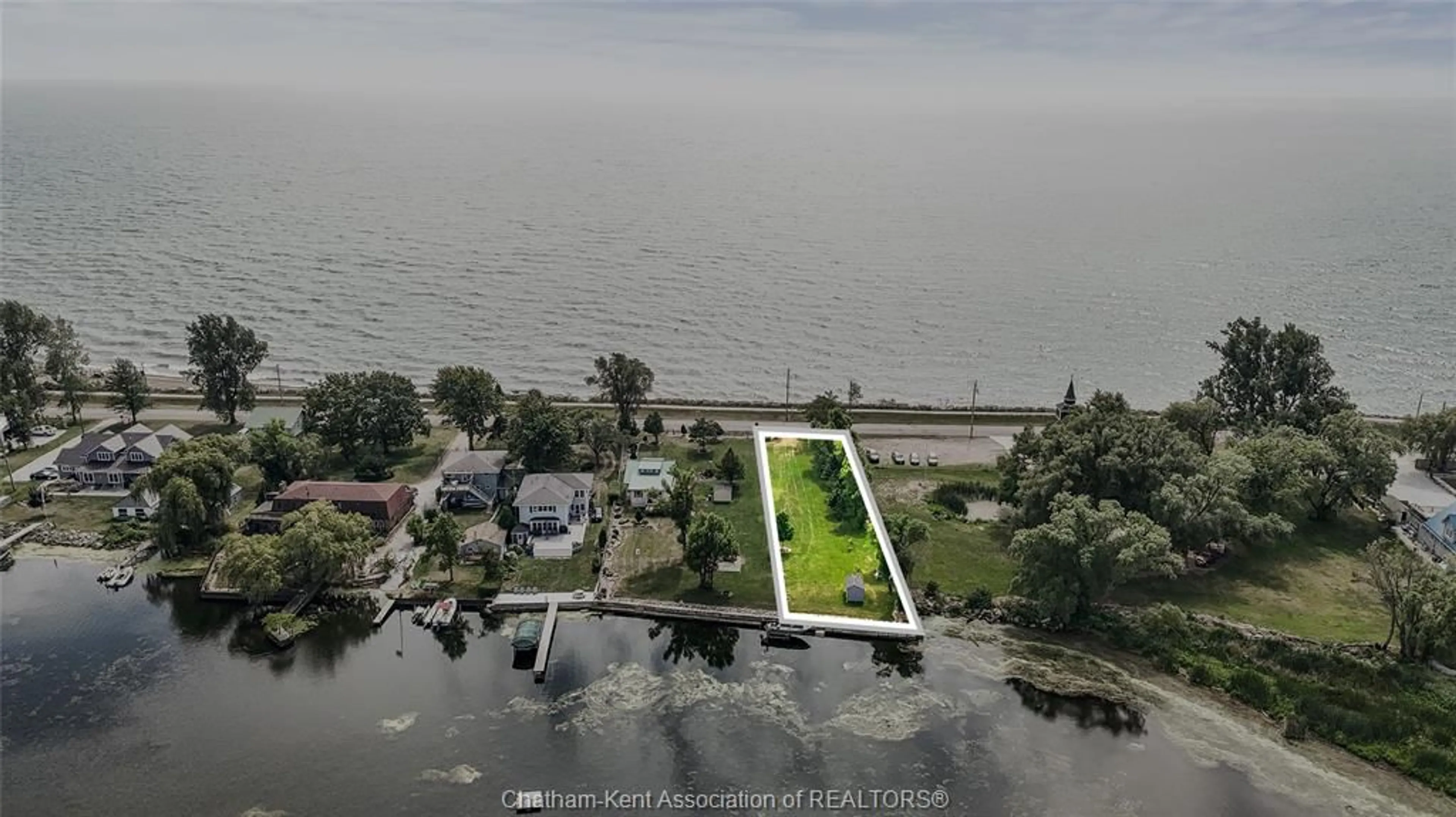 A pic from outside/outdoor area/front of a property/back of a property/a pic from drone, water/lake/river/ocean view for 100 ROSS Lane, Erieau Ontario N0P 1N0