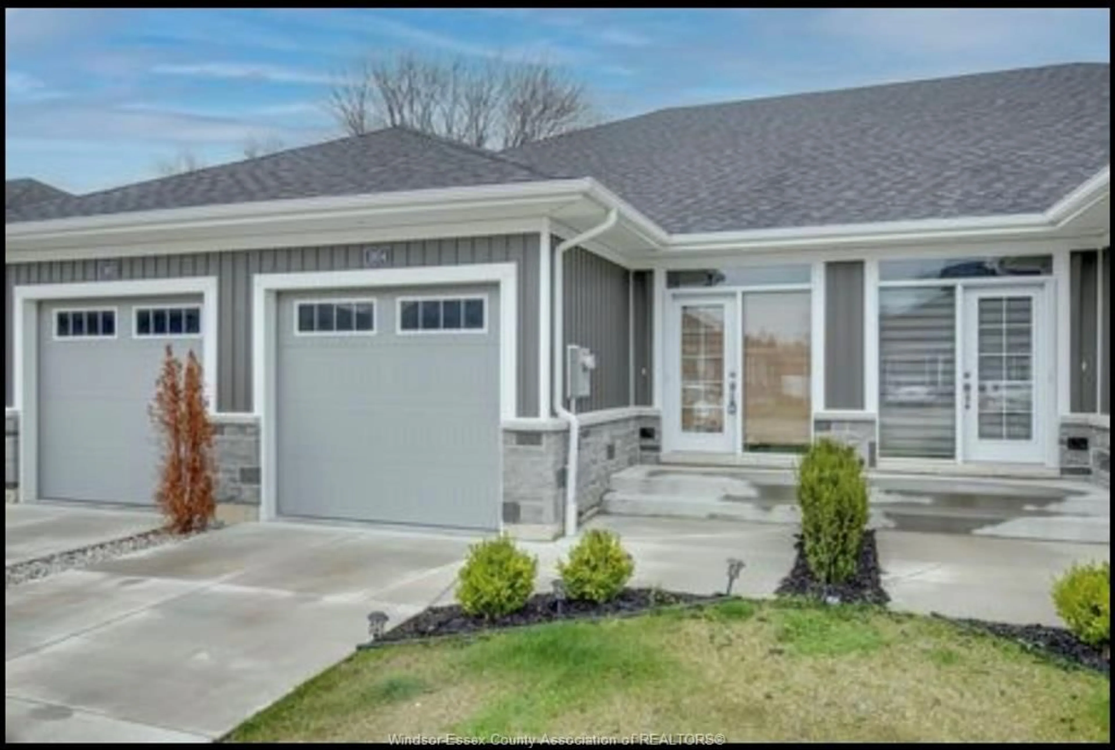 Home with vinyl exterior material, street for 1954 ETHAN Crt, Windsor Ontario N8T 0B3