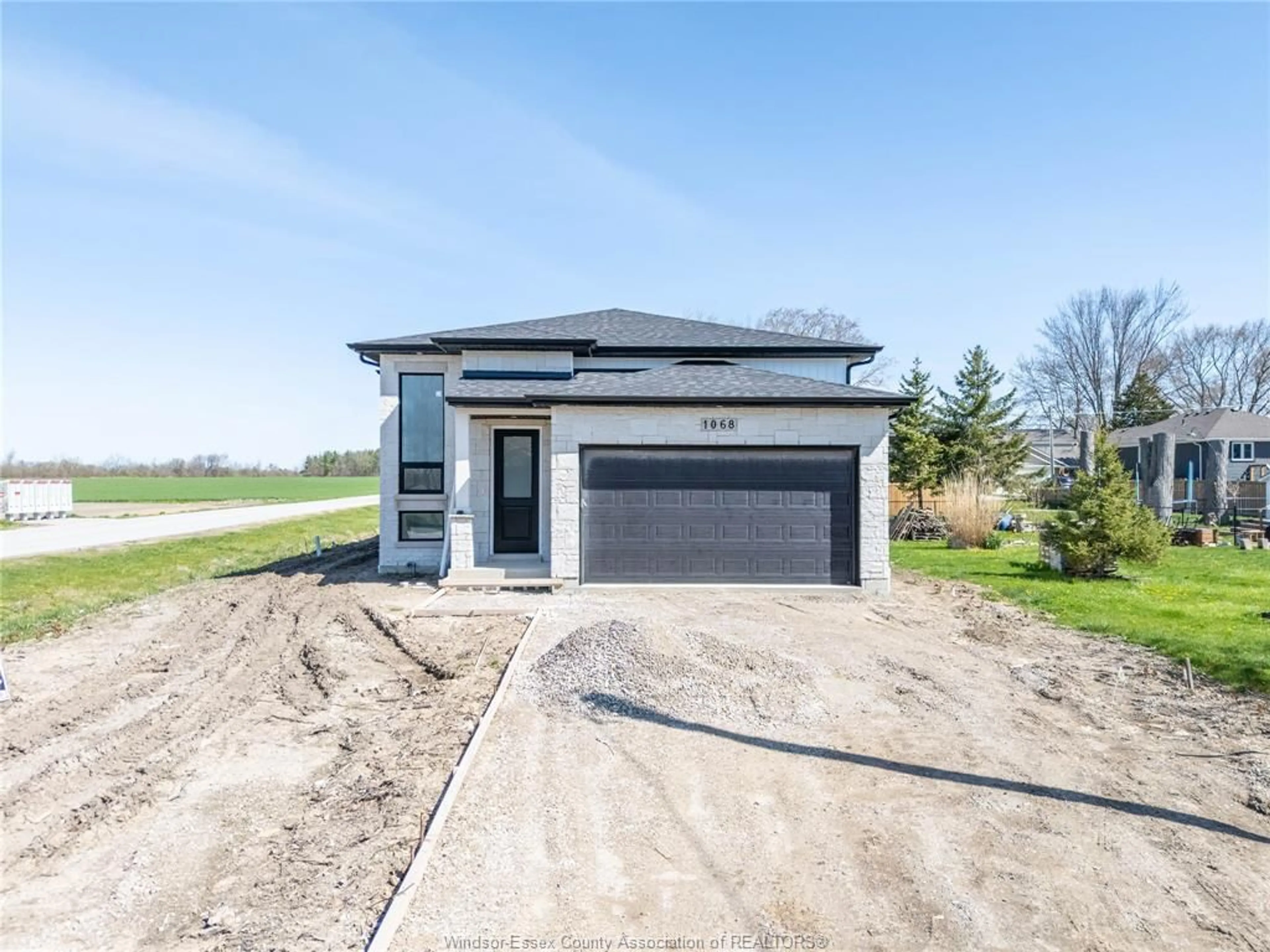 Home with brick exterior material, unknown for 1068 BIRCH Ave, Kingsville Ontario N9Y 3V1