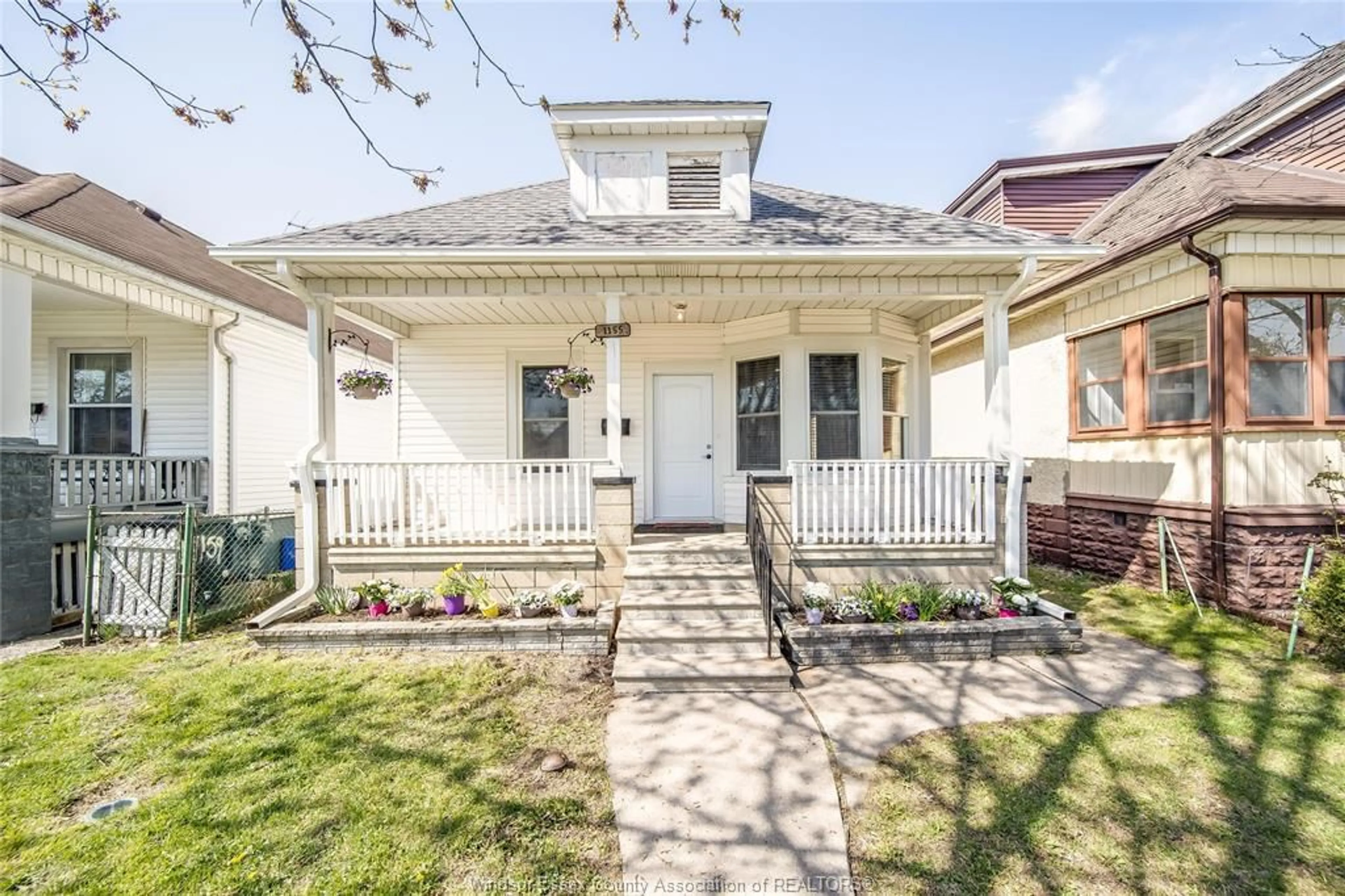 Home with vinyl exterior material, street for 1155 MOY Ave, Windsor Ontario N9A 2P4