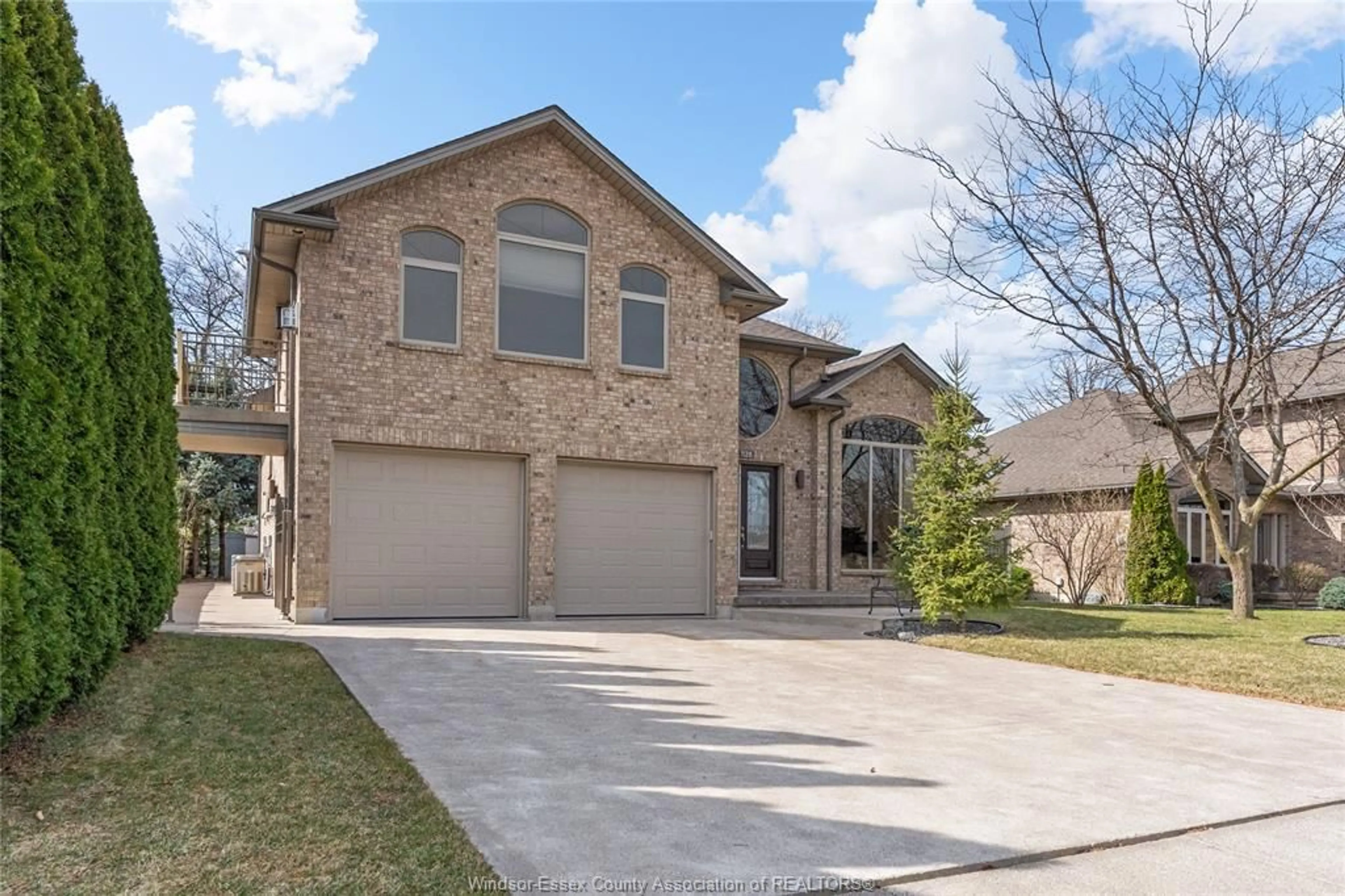 Home with brick exterior material, street for 1128 JILLIAN Crt, Lakeshore Ontario N8L 0W7