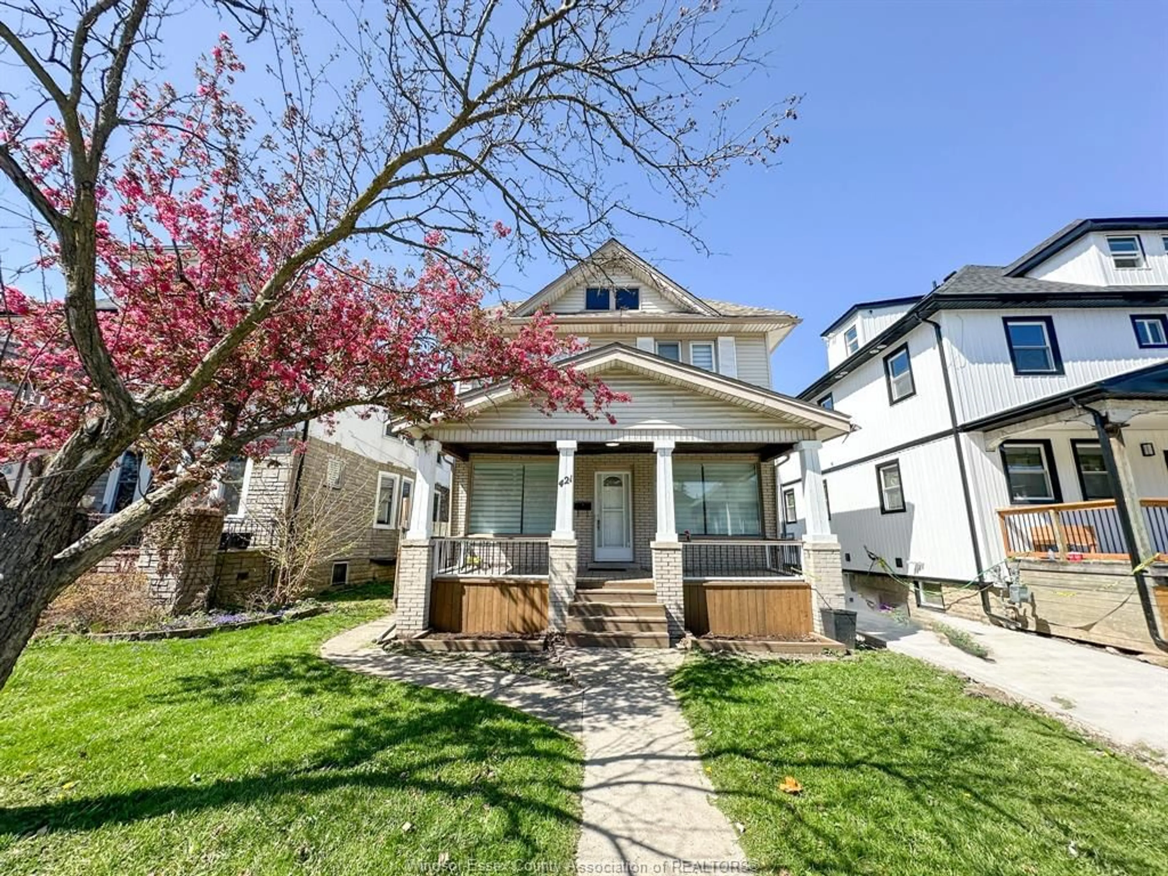 Home with vinyl exterior material, street for 421 HALL, Windsor Ontario N9A 2L7