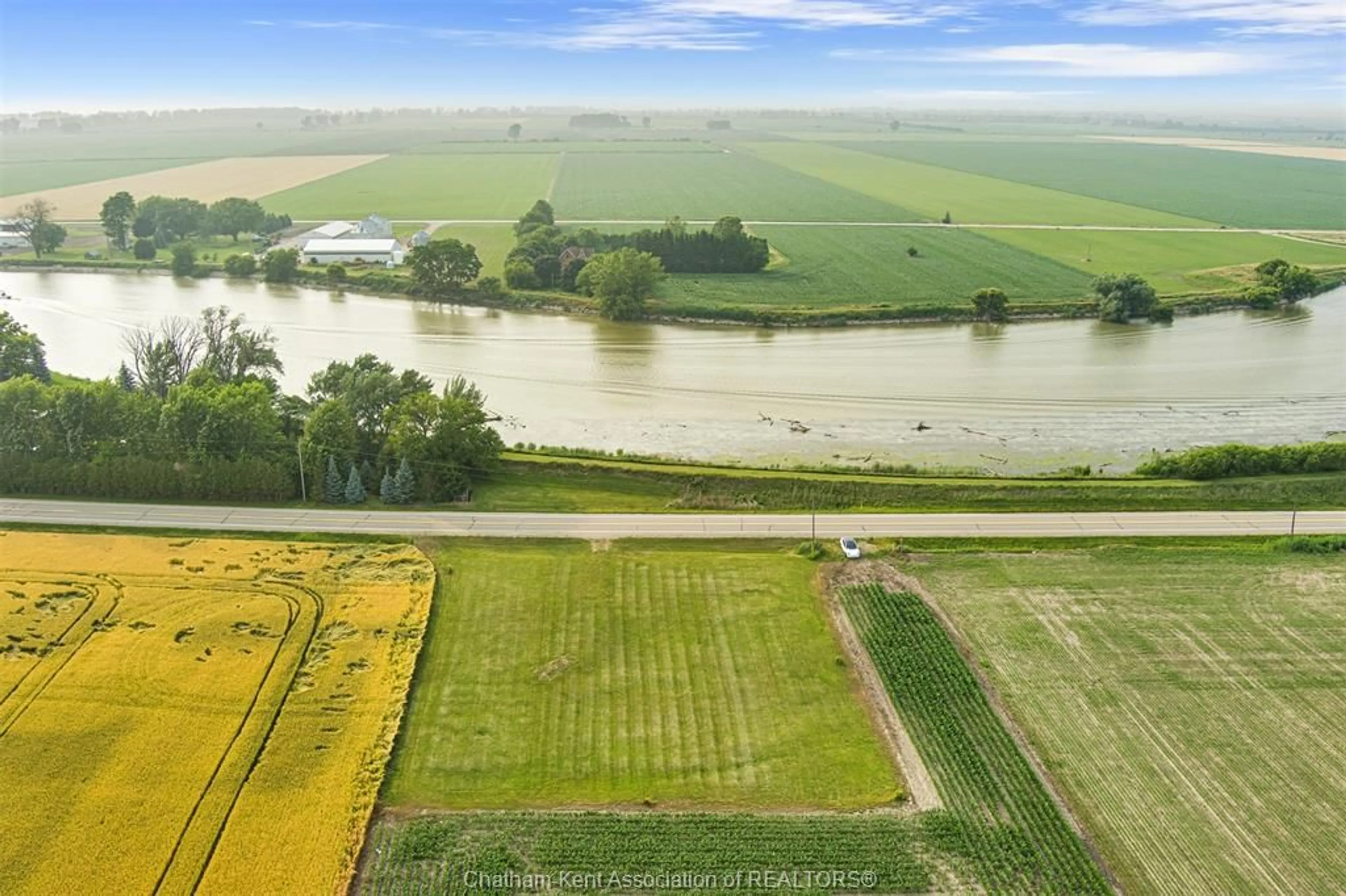 A pic from outside/outdoor area/front of a property/back of a property/a pic from drone, water/lake/river/ocean view for 5208 Tecumseh Line, Chatham-Kent Ontario N0P 2L0