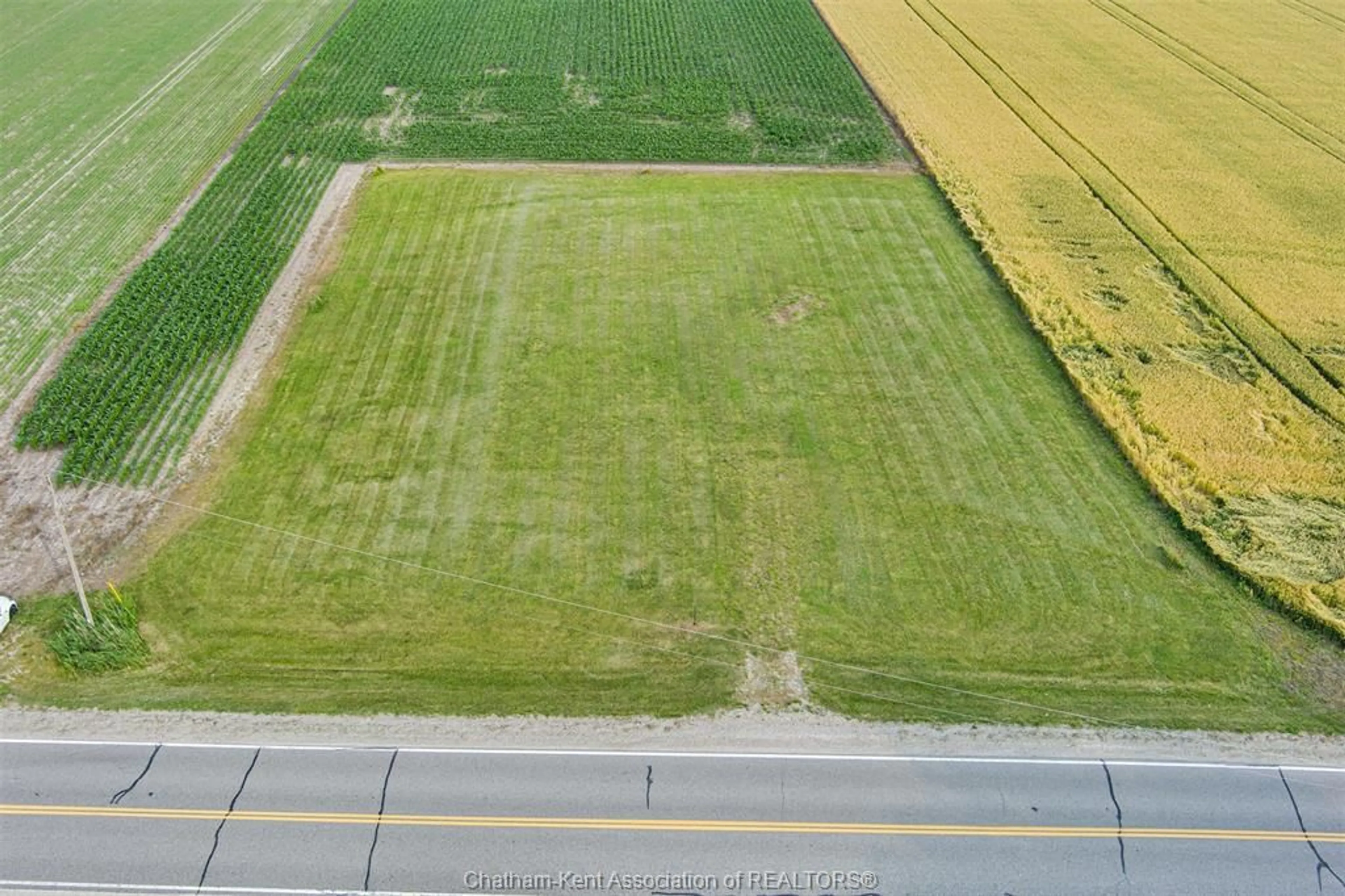 A pic from outside/outdoor area/front of a property/back of a property/a pic from drone, street for 5208 Tecumseh Line, Chatham-Kent Ontario N0P 2L0