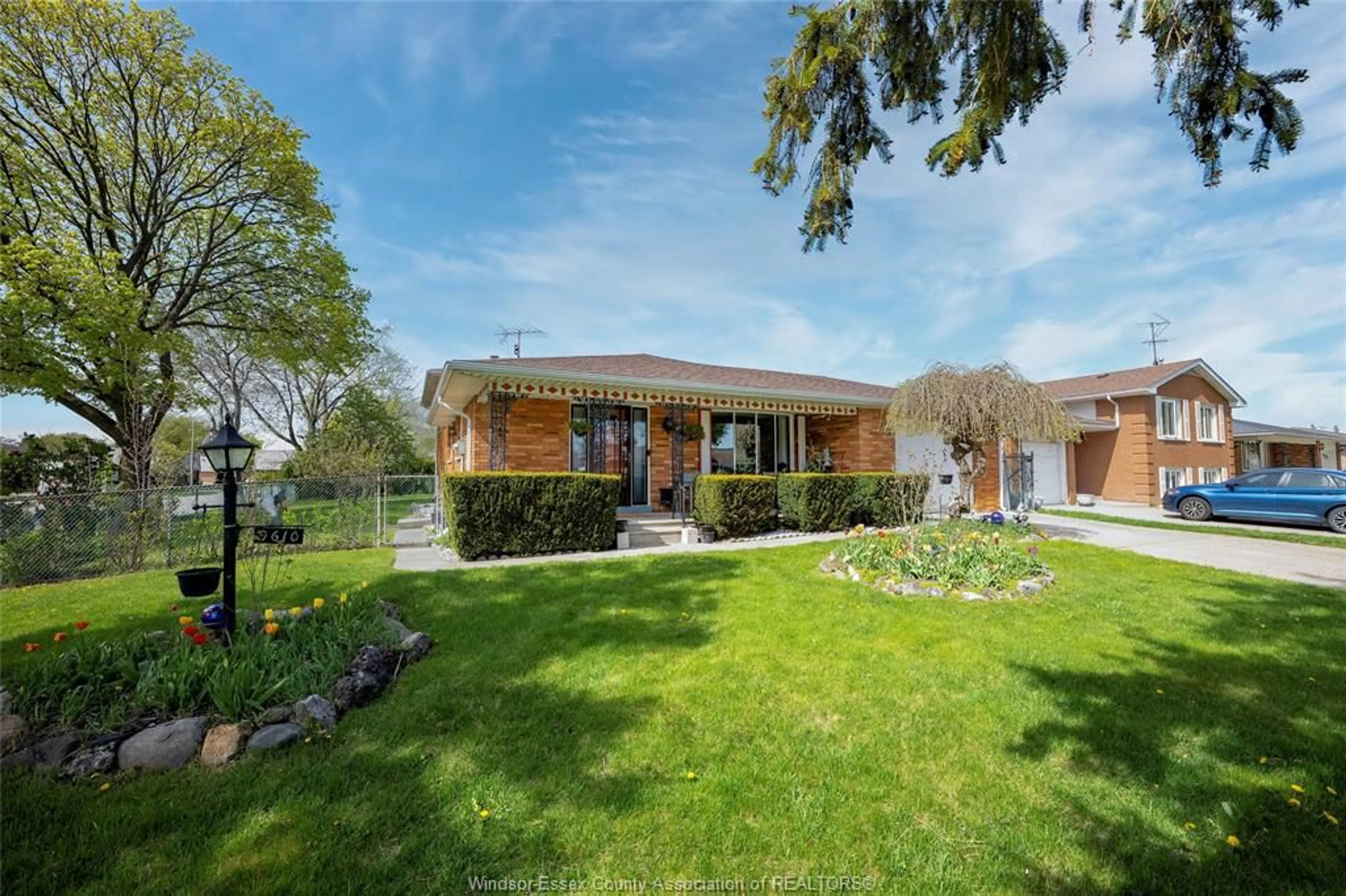 Home with brick exterior material, street for 9610 Asgard Rd, Windsor Ontario N8R 1E2