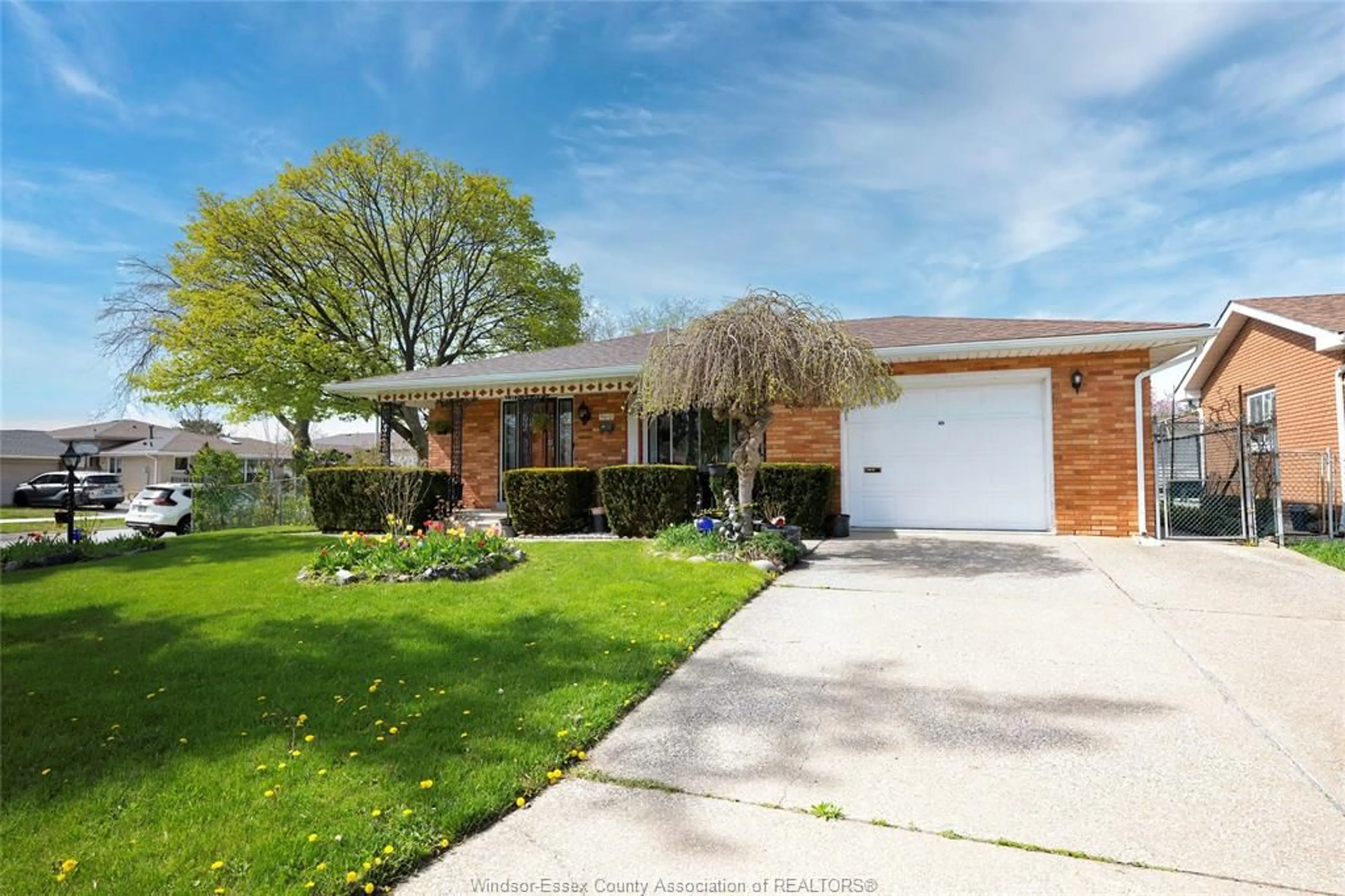 Home with brick exterior material, street for 9610 Asgard Rd, Windsor Ontario N8R 1E2