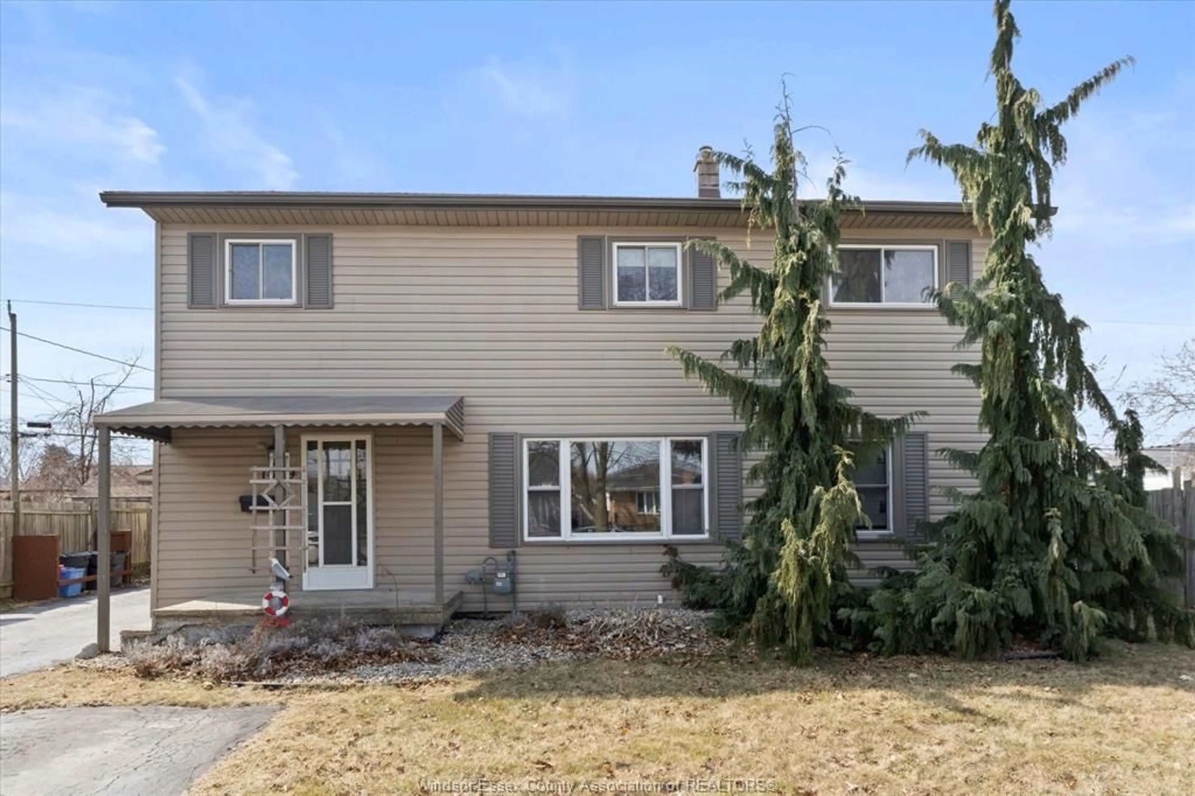 Home with vinyl exterior material, street for 1859 Ford Blvd, Windsor Ontario N8T 2E2