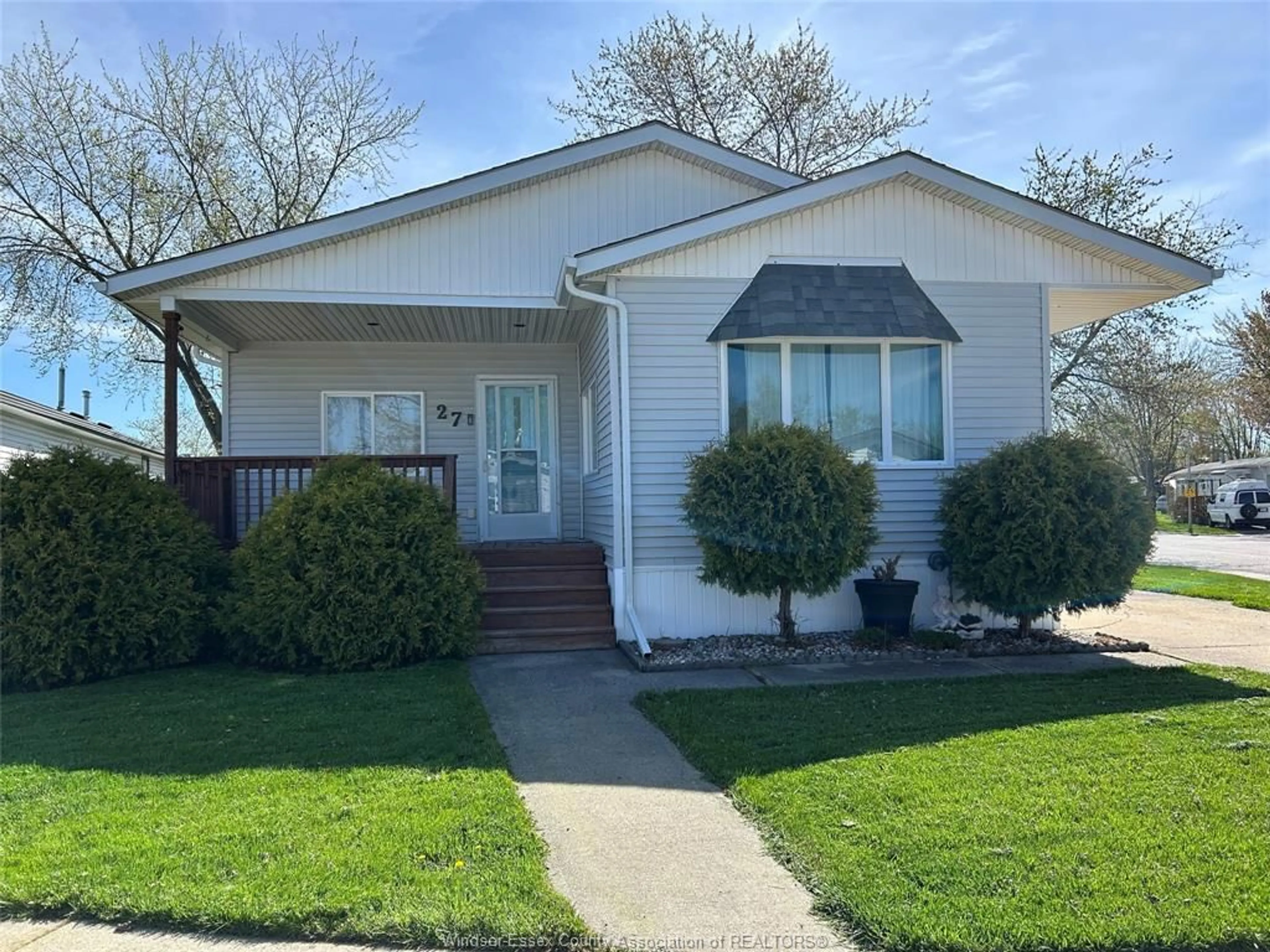 Home with vinyl exterior material, street for 27 SPRUCE, McGregor Ontario N0R 1J0